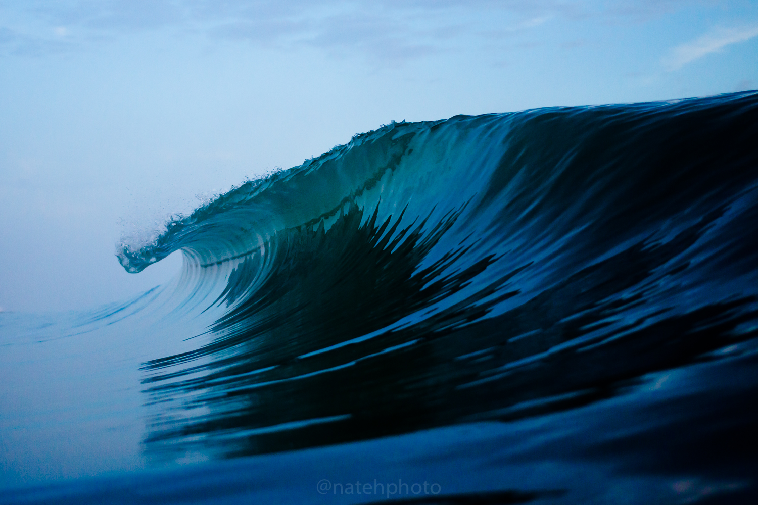 This is probably my favorite image from the shoot. The surf was so calm that the reflections of the barrels were the only way to determine where the wave was actually breaking. My photos make a clearer, more distinctive look than how it was in the moment. Its good that the camera captures more than the eye. 