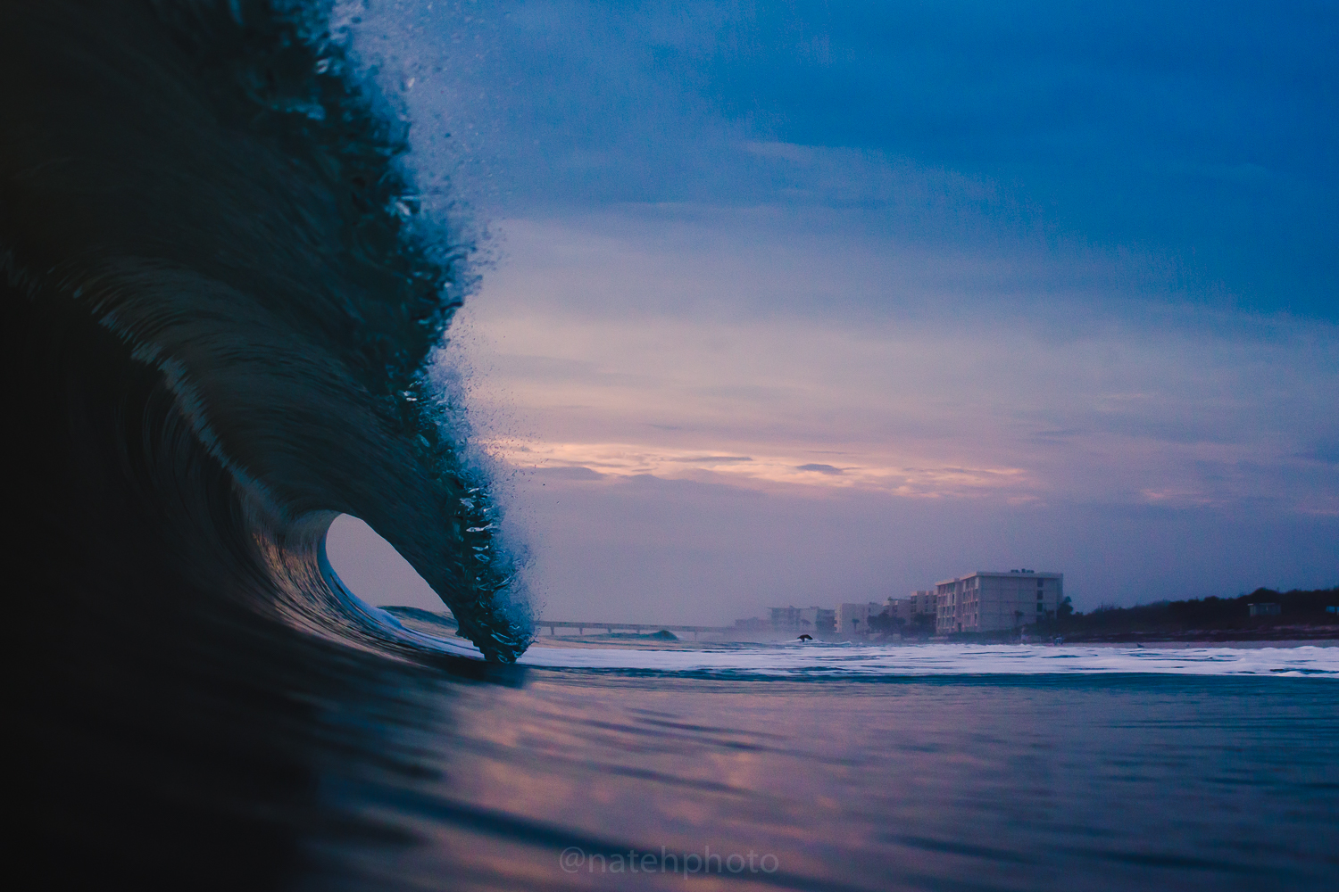 A perfect moment. As this barrel touches down and the pelican fly's toward shore, the lighting and ocean all came together to make one brilliant image. 