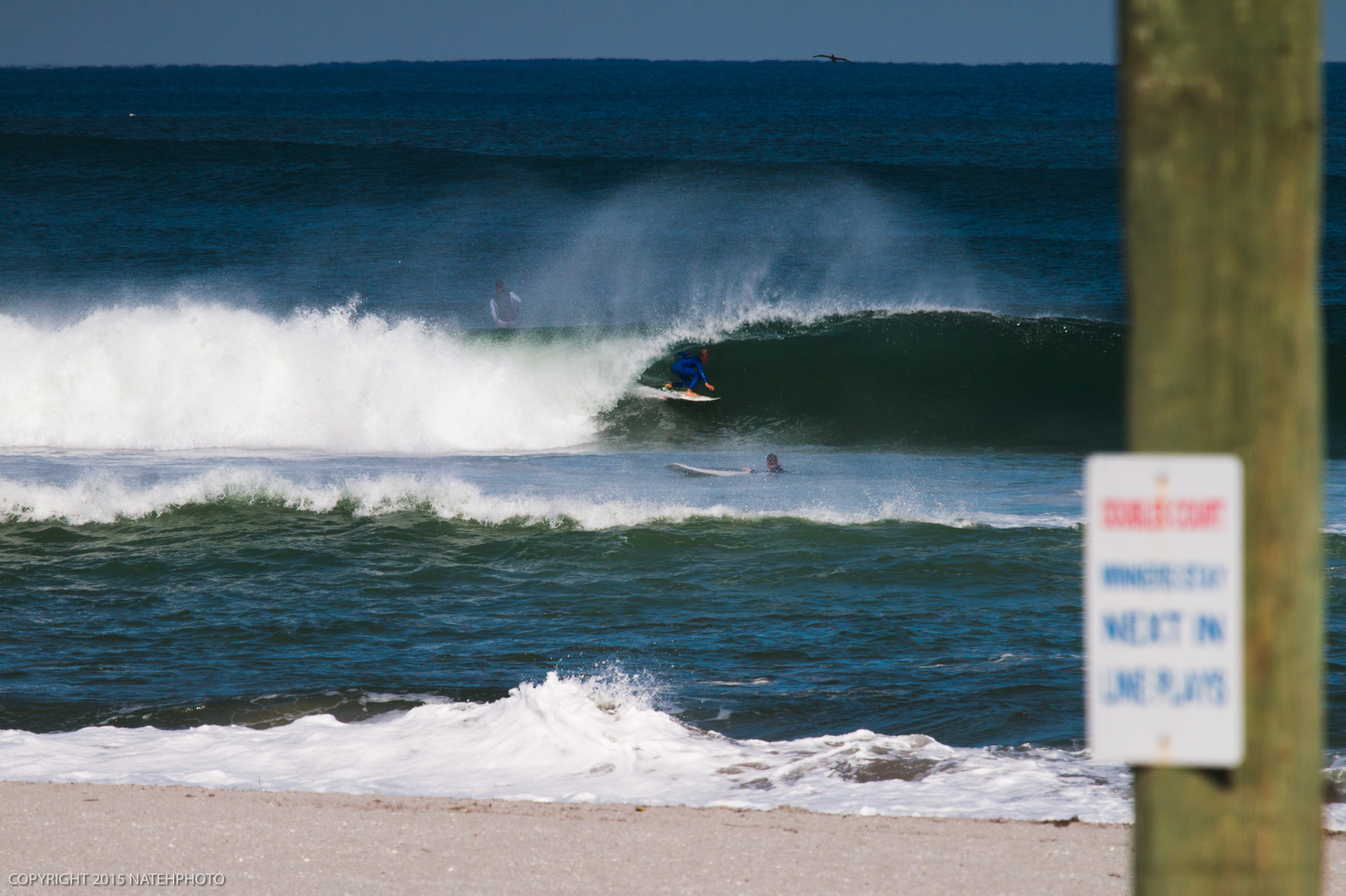 Tommy Coleman was really loving being a goofy footer out there. He was barreled, came out and did an air reverse which he did ride away from. That pole got in my way. 