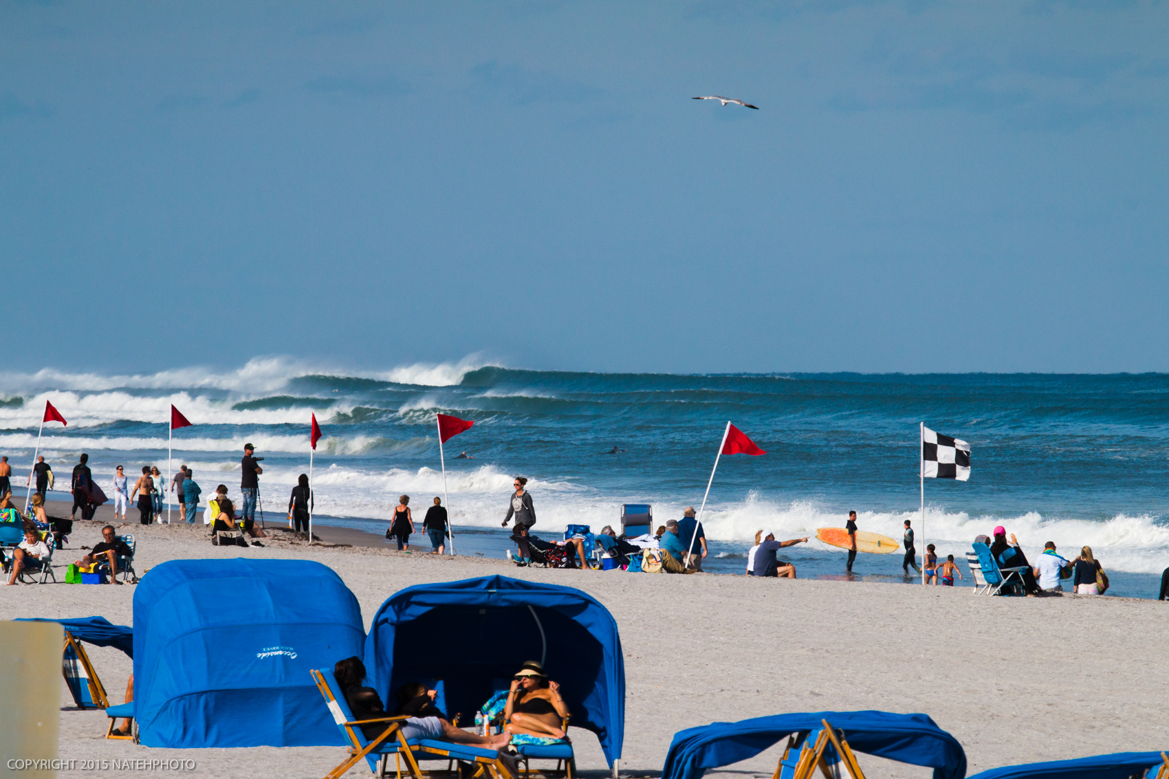 Watching these sets roll in from miles away was pretty cool, at least I thought so. However these people strategically placed there shade canopy as an anti-surf canopy. 