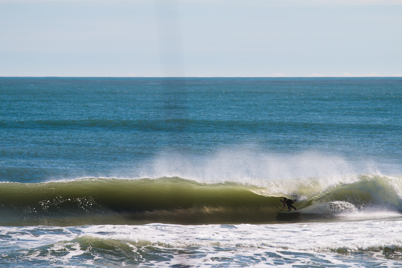 Another unknown to me reaping the benefits of a good wind swell. 