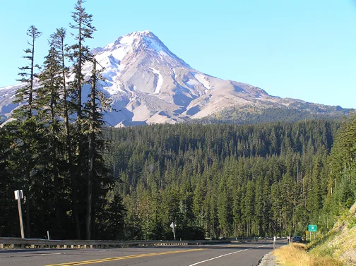A scenic roadway with Mt Hood in the near distance.