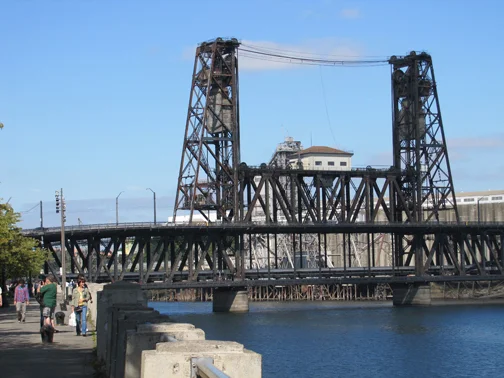 The Steel Bridge is a double-deck vertical-lift bridge across Portland's Willamette River.