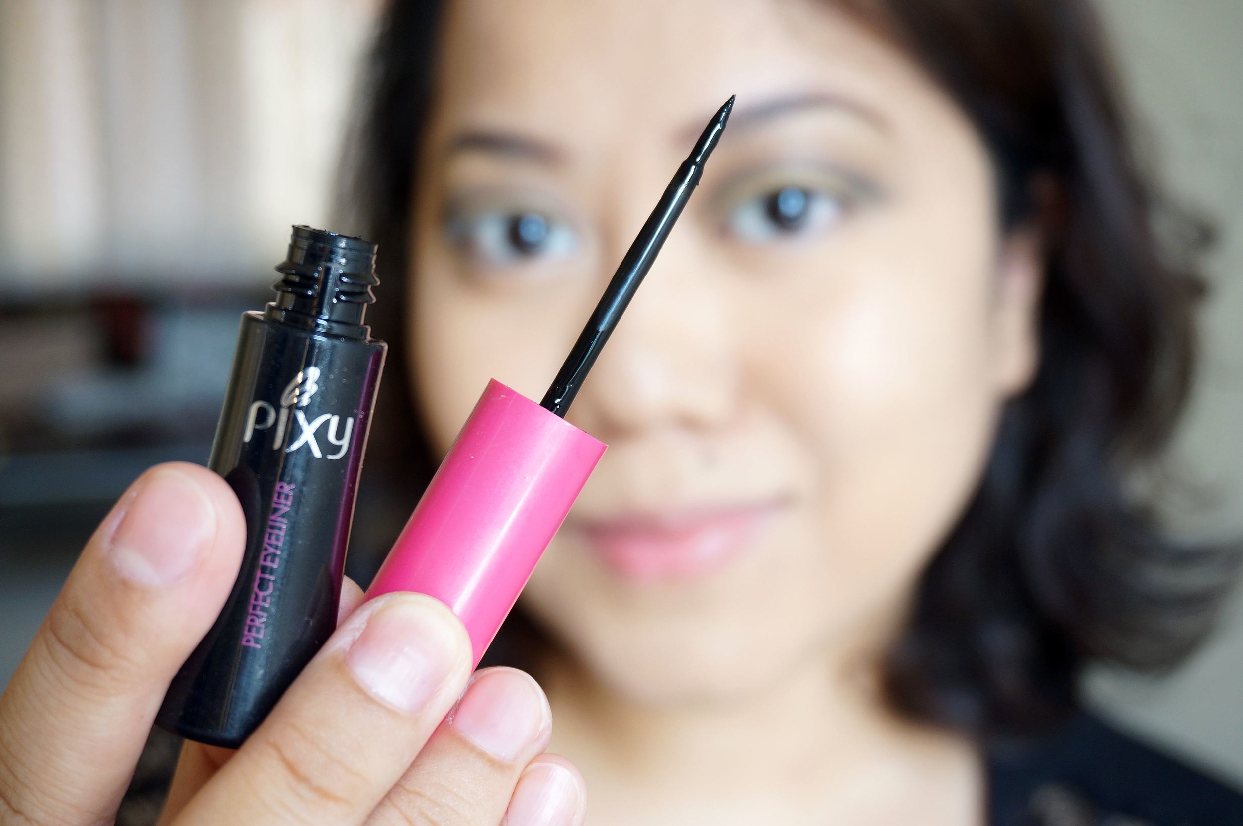  Step 9: Line your eyes with the Pixy Perfect Eyeliner in Black (P325). I recommend a thick line with a slightly winged edge. 