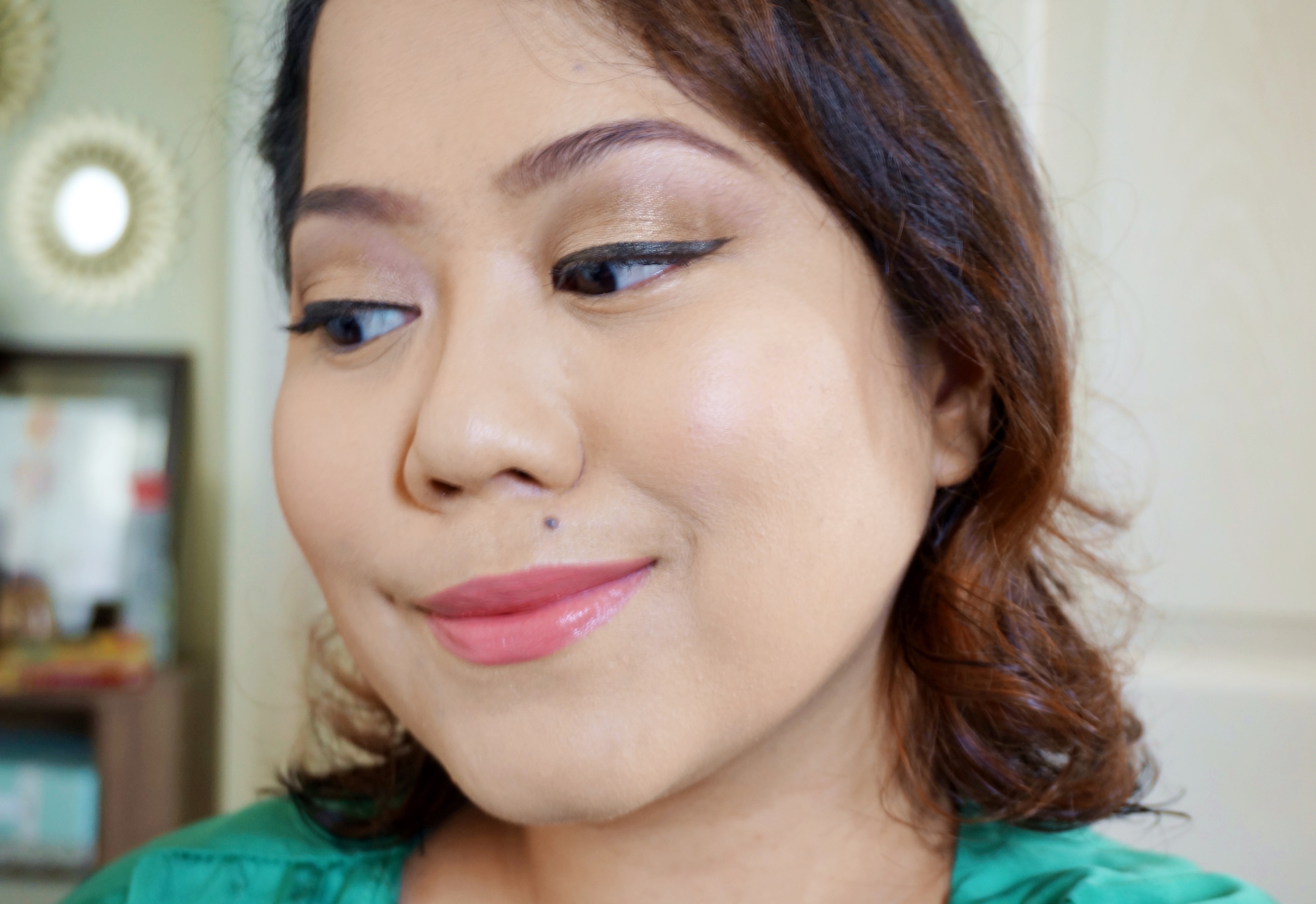 In this look, I used the taupe brown on the 2nd column, 2nd row on my eyebrows. I applied the gold (3rd column, 2nd row) all over my lids, then blended the bronze (4th column, 1st row) on my crease. I added a tinge of the black (6th column, 2nd row) on the outer v for a bit of definition. Finally, I placed the matte beige (3rd column, 1st row) right underneath my brows.