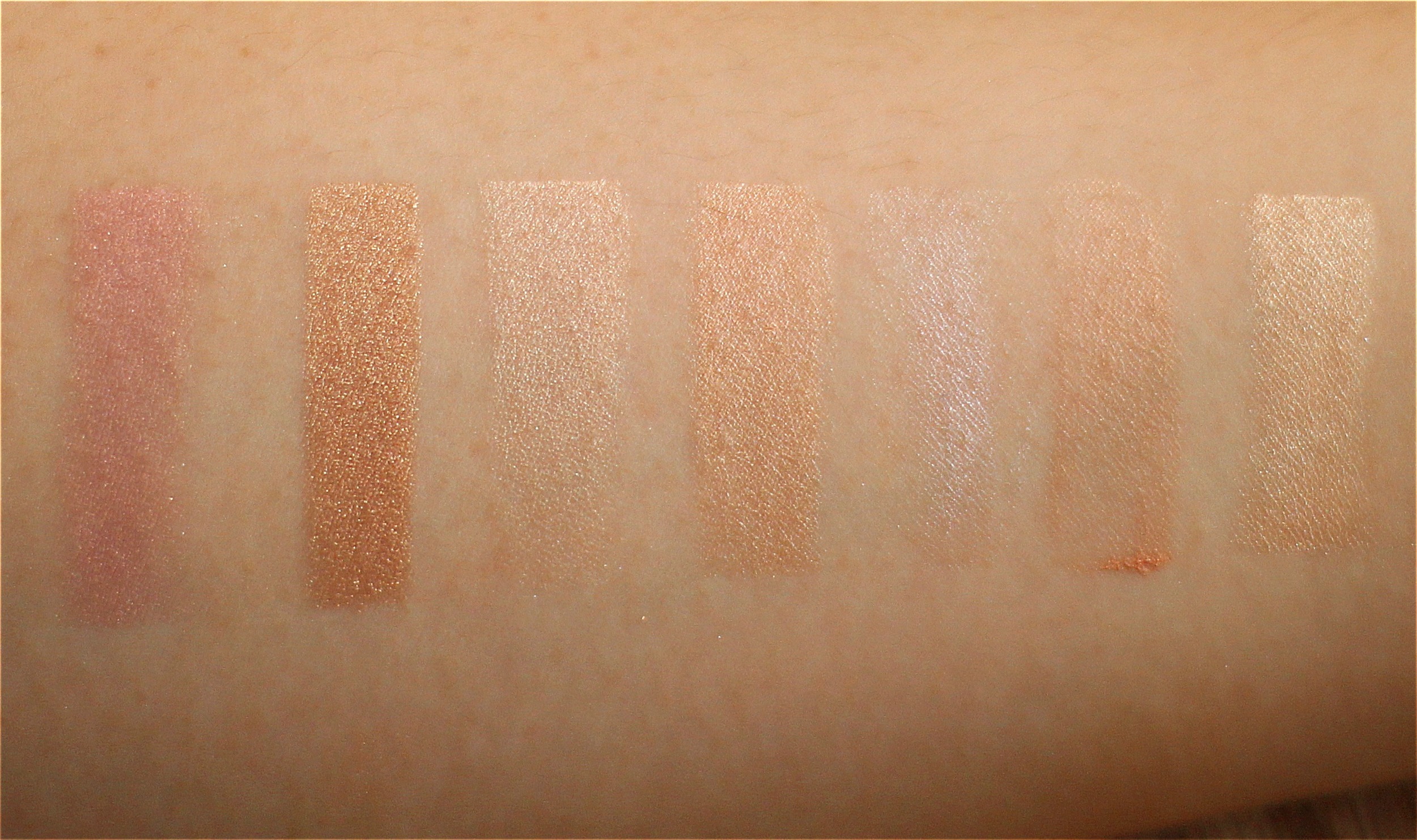Left to right: Bobbi Brown Shimmer Brick in Lilac Rose, Becca Shimmering Skin Perfector Pressed in Opal, Laura Mercier Matte Radiance Baked Powder, Benefit Watt's Up, Benefit High Beam, Pixi Flawless Beauty Primer, TheBalm Mary Lou-manizer