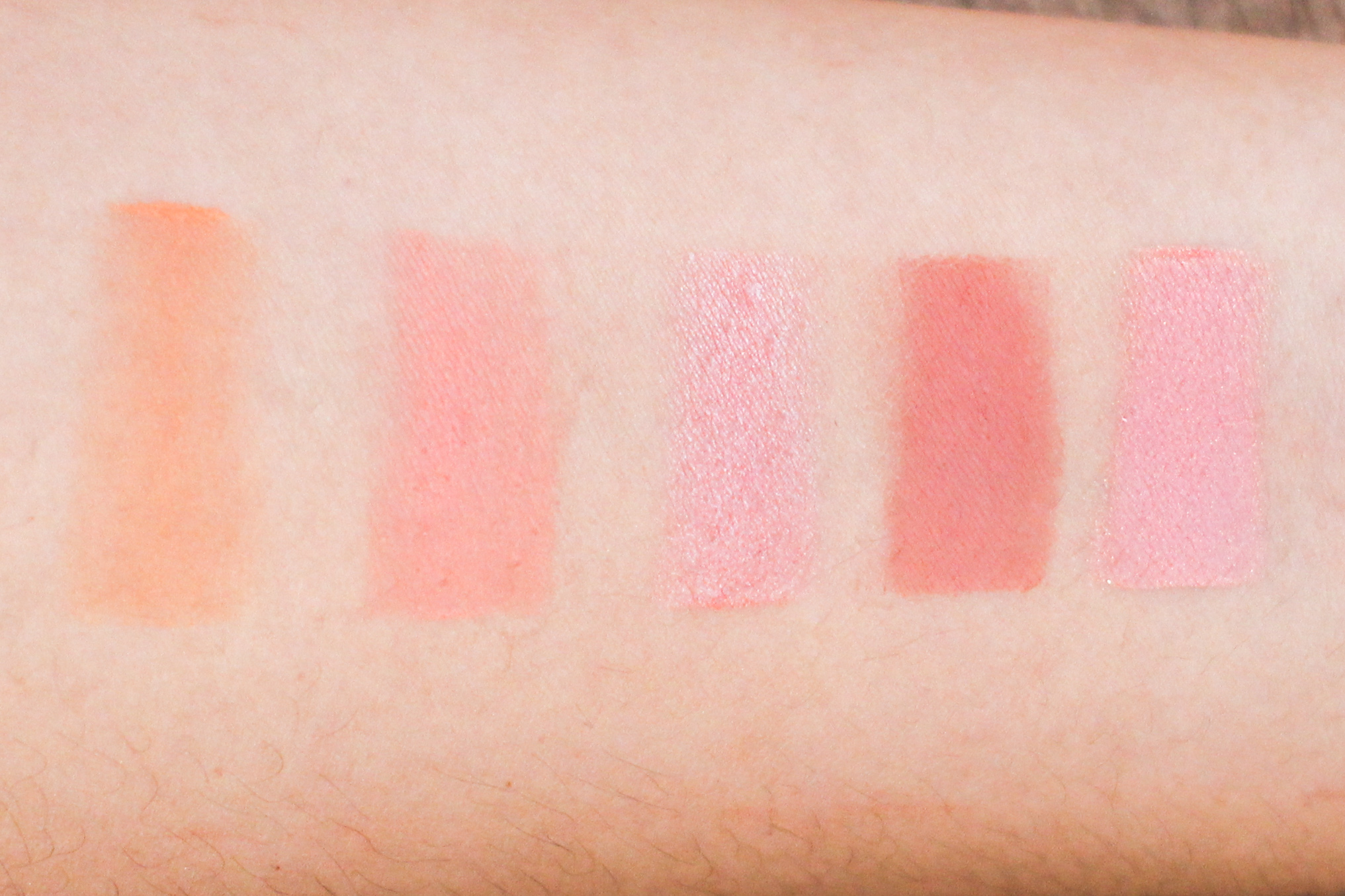 Left to right: Benefit Majorette, Happy Skin Get Cheeky with Me Blush in Summer Fling, Covergirl Cheekers in Pretty Peach, Pink Sugar Sweet Cheeks HD Blush in Miss Independent, Ellana Mineral Blush Peach Passion