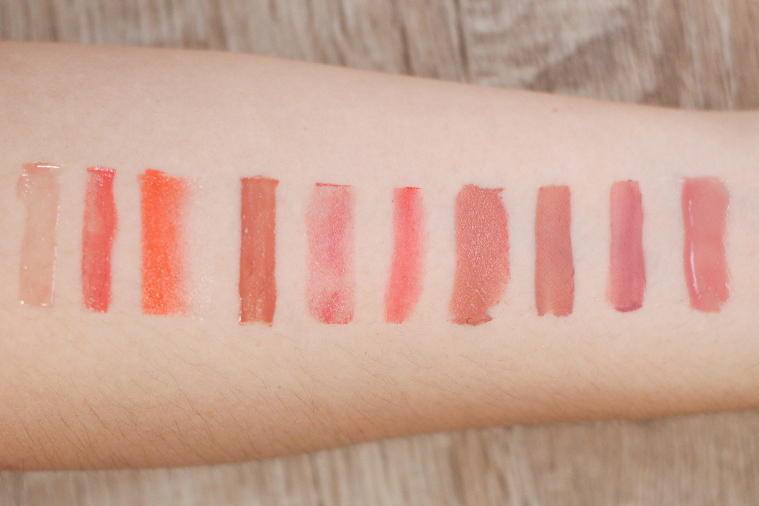 Left to right: Lunasol Liquid Lips (clear), Lunasol Coloring Lips (apricot), Laneige Two Tone Lip Bar in No. 13 Orange Blurring, Happy Skin Lip and Cheek Mousse in Warm and Toasty, Burt’s Bees 100% Natural Lipstick in 523 Sunset Cruise, L’Oreal Tint Caresse in Tulip Blossom, Pink Sugar HD Lipstick in Naked, Inglot HD Lip Tint Matte in #17, Sleek Matte Me Lip Cream in Birthday Suit, NYX Butter Gloss in Tiramisu