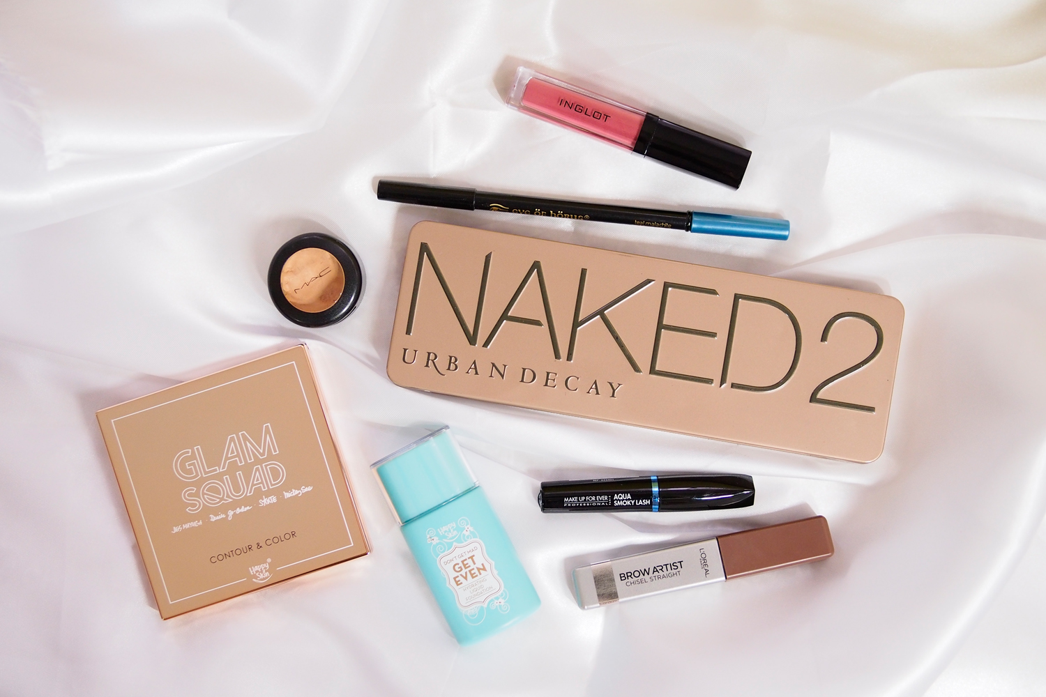 Happy Skin Glam Squad Contour & Color, Urban Decay Naked 2 Eyeshadow Palette, Inglot HD Lip Tint, Eye of Horus Goddess Pencil, Make Up For Ever Aqua Smoky Lash Mascara, MAC Studio Fix Concealer, L’Oreal Brow Artist Chisel Straight, Happy Skin Don’t Get Mad Get Even Liquid Foundation