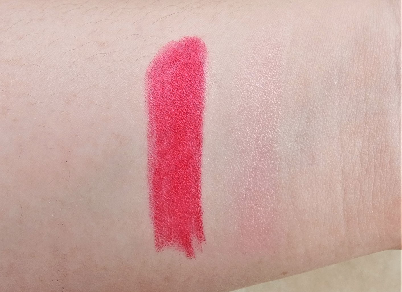 From left: creamy matte lipstick and lip gloss (barely visible, sheer light pink)