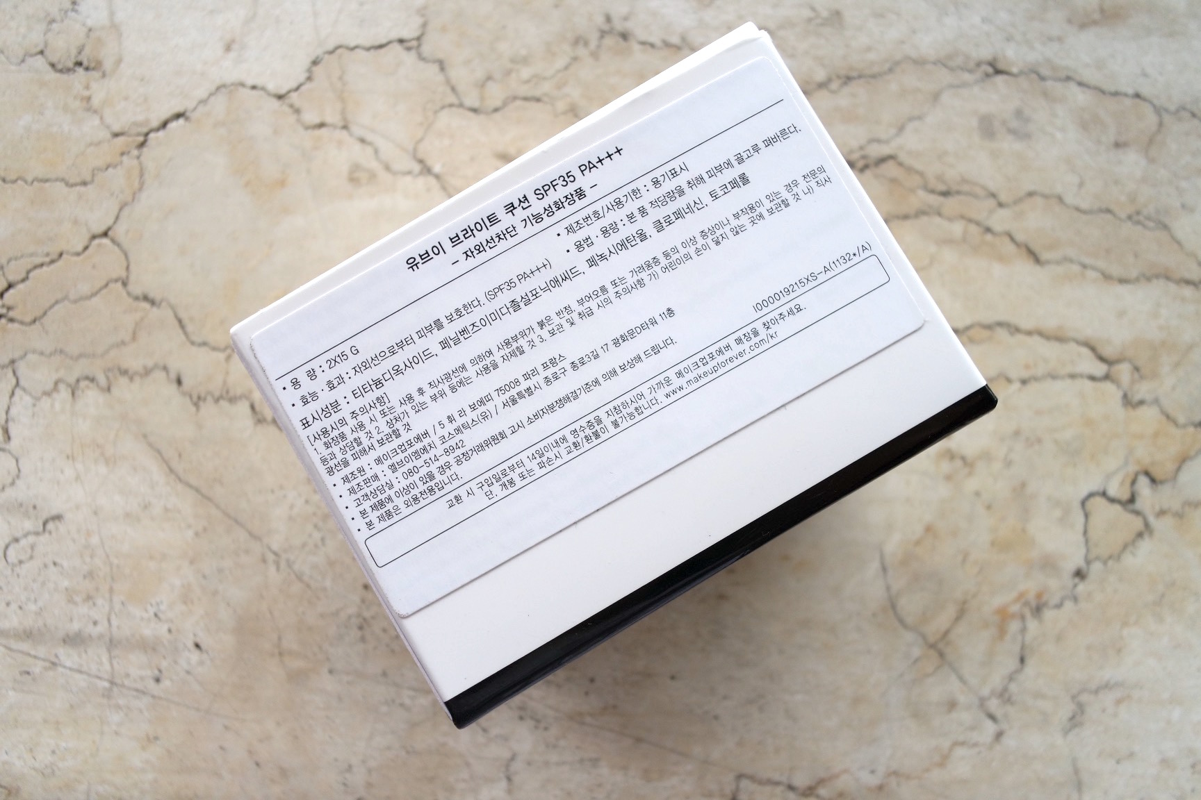 This MUFE UV Bright Cushion has a Korean label stuck on the box.