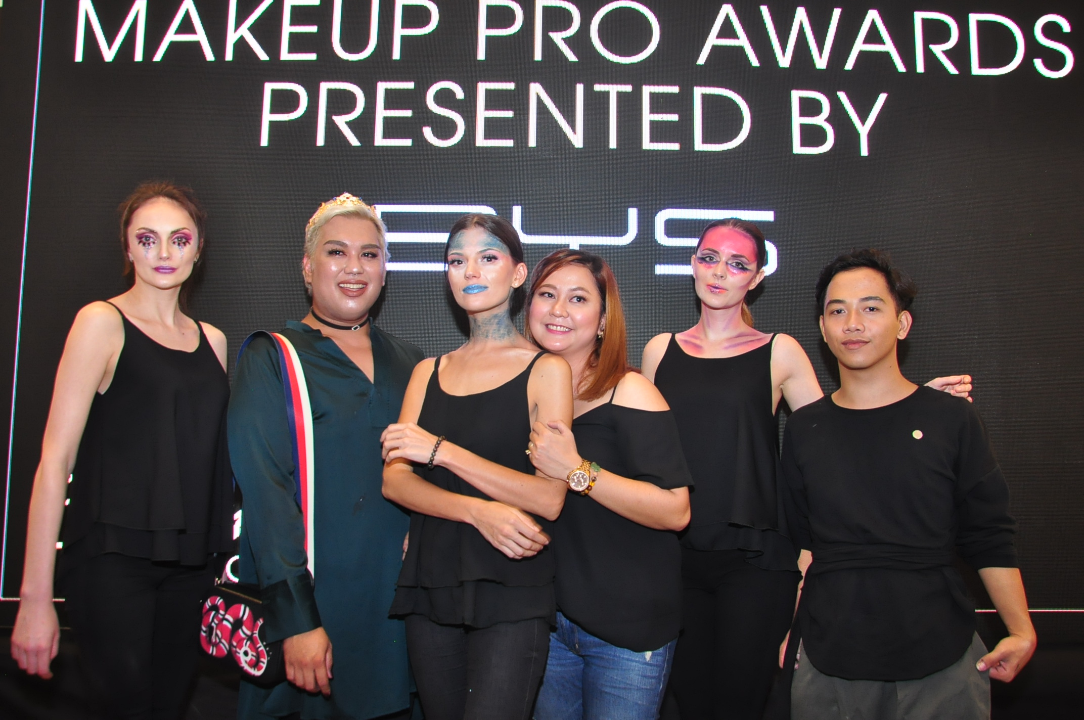 Contestants Nap Candelaria, Muriel Jade Nubla, and Zidjian Floro with their models