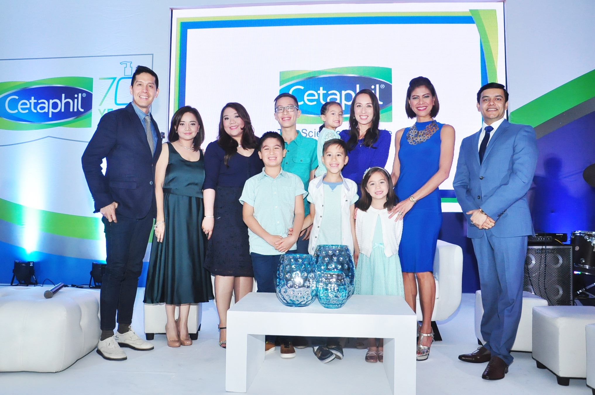 The Galderma team - Jade Silva Netto-Ponoc, Catherin Palma-Dilanco and Raghavendra Sadashiva with host Suzi Entrata and Cetaphil endorsers the Mendoza family, Edric, Joy, Elijah, Edan, Titus, Tiana and Catalina