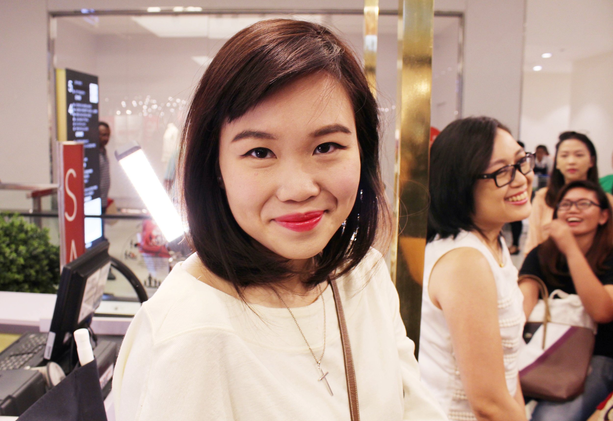 The final Shisedo look: neutral brows, cat-eyes, and a bold, blooming lip
