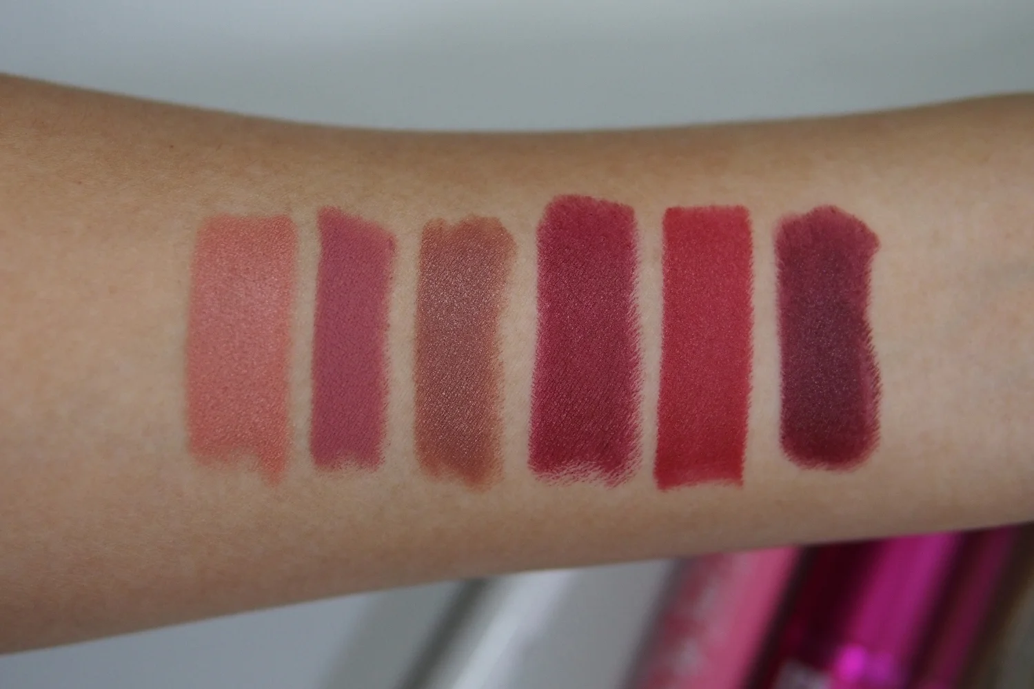 From left: MAC Kinda Sexy, Colourpop Cami, Project Vanity x These Lips Don’t Lie Love at First Swipe, Vice Kavogue, Estee Lauder Burning Love, Happy Skin Hot Stuff