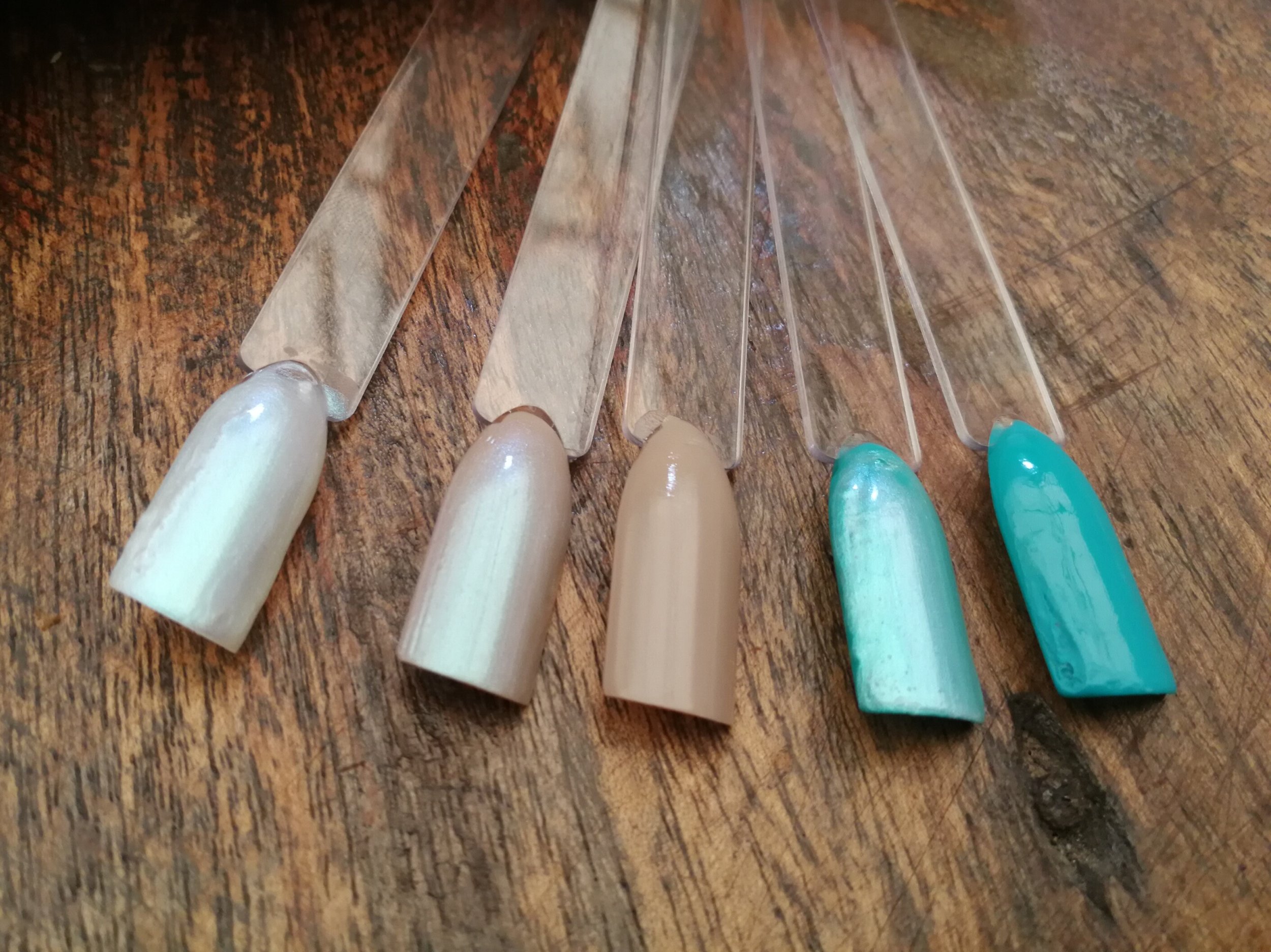Swatches, from left: Goddess, Hero layered with Goddess, Hero, Wanderer layered with Goddess, Wanderer