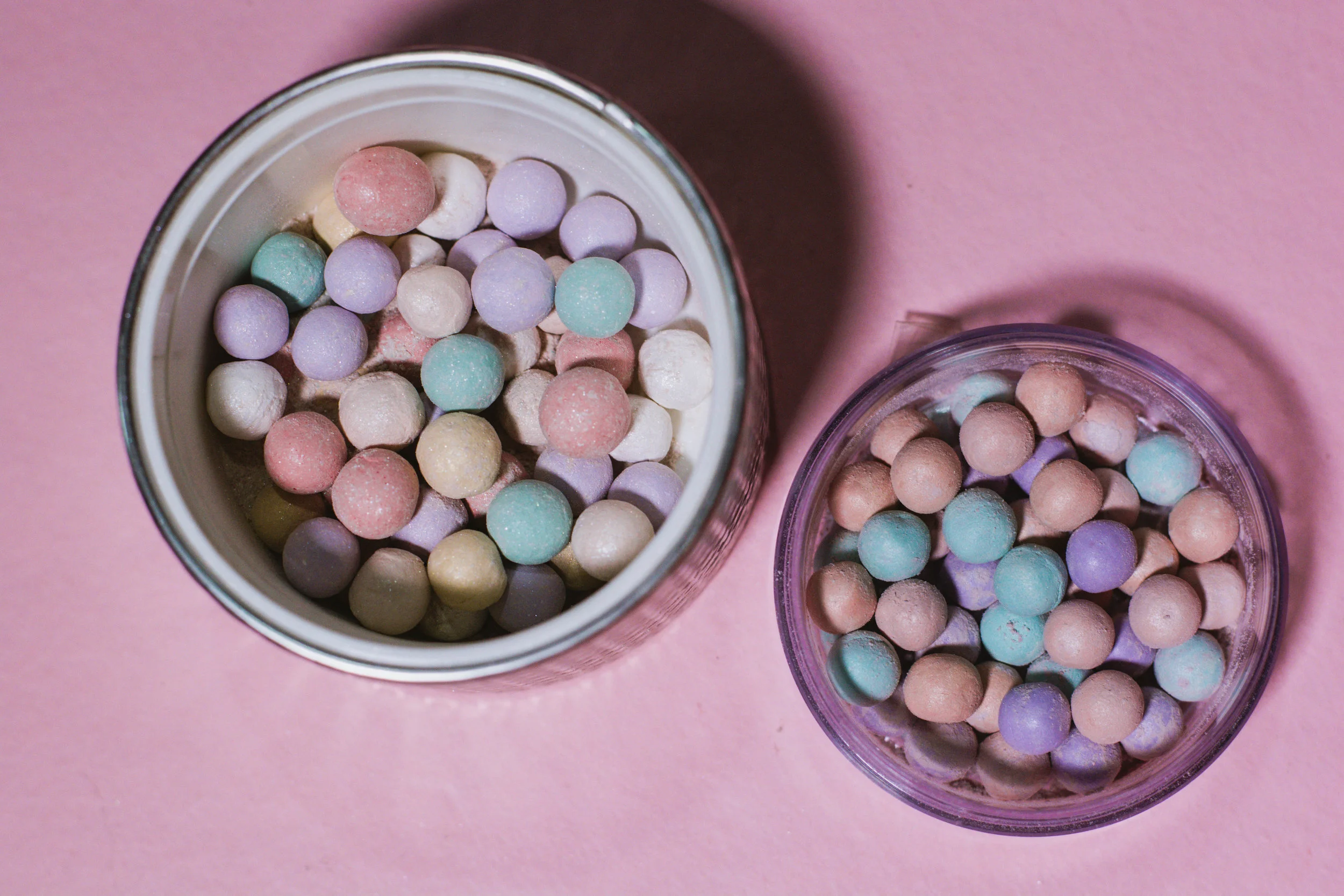 Guerlain versus Essence: The former contains microshimmers and has more light-colored pearls for an illuminating effect