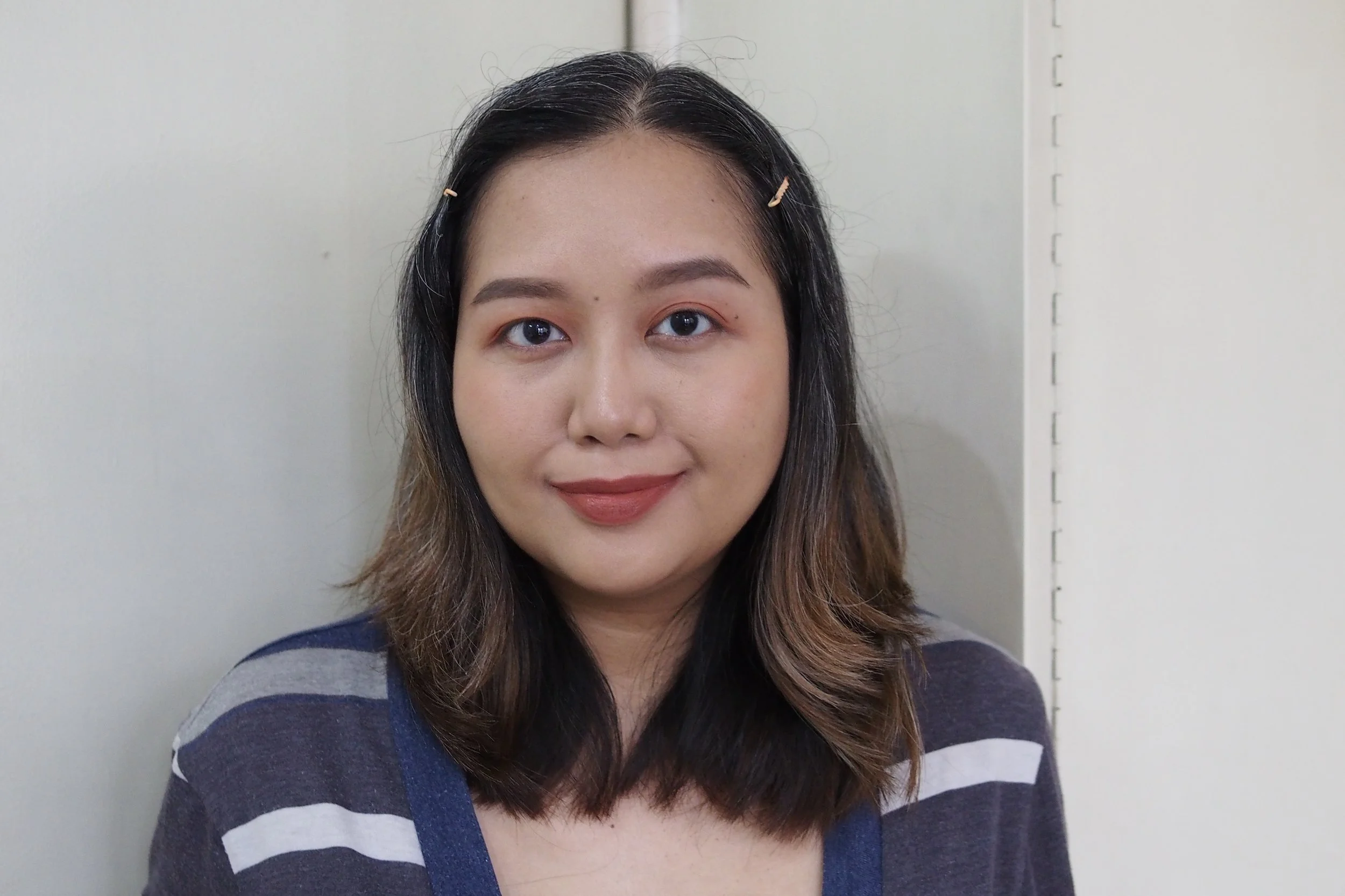 Skin Tint Sun Shield in Butterscotch, Universal Brow Stick Pencil in Taupe, Universal Tint Duo Matte in Nutmeg on the eyes, Universal Tint Duo Water in Nutmeg on the cheeks and lips