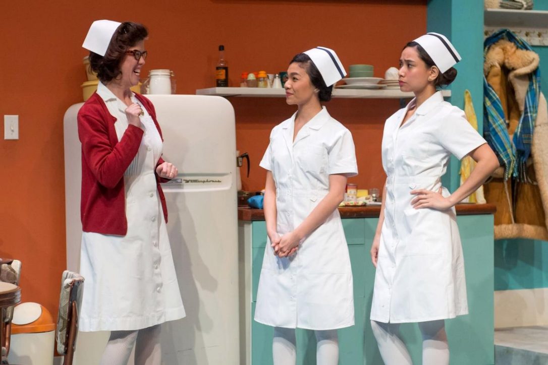 L to R: Catherine Fitch as Marie Anne Lussier, Belinda Corpuz as Puring Saberon and Isabel Kanaan as Penny Uy. Set Design by Jung-Hye Kim, Costume Design by Anna Treusch, Lighting Design by Jareth Li. Image credit: Josephy Michael Photography. 