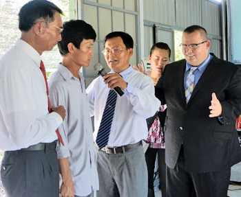 One of the church building crew receives Christ.