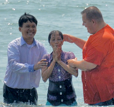 Baptizing in the ocean