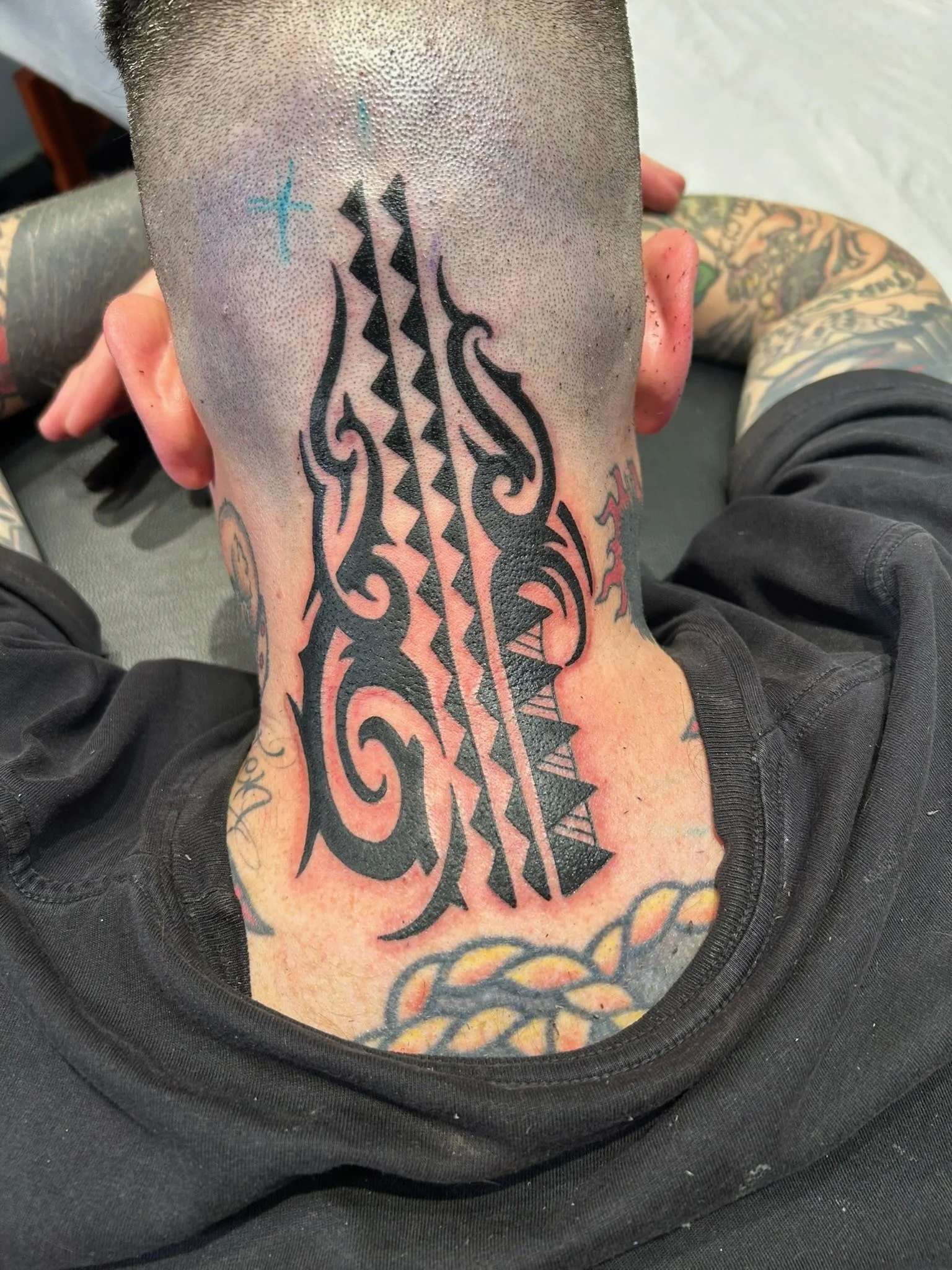 great-lakes-tattoo-chicago-tribal-geometric-neck-tattoo-min.jpeg