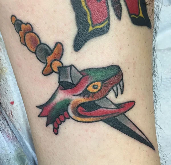 mike dalton traditional snake and dagger tattoo -min.jpg