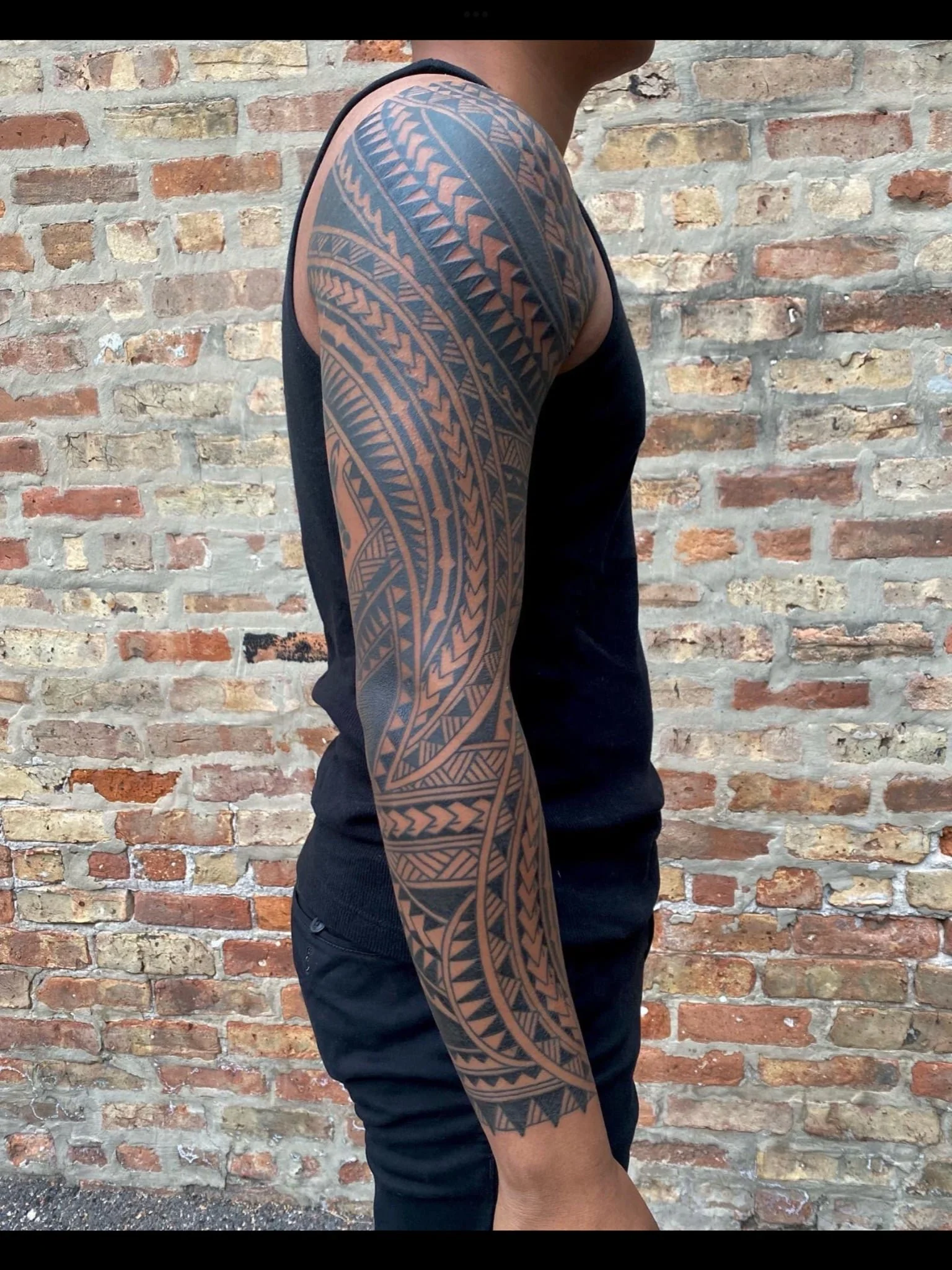 tribal sleeve tattoo Chip Douglas Great Lakes Tattoo 