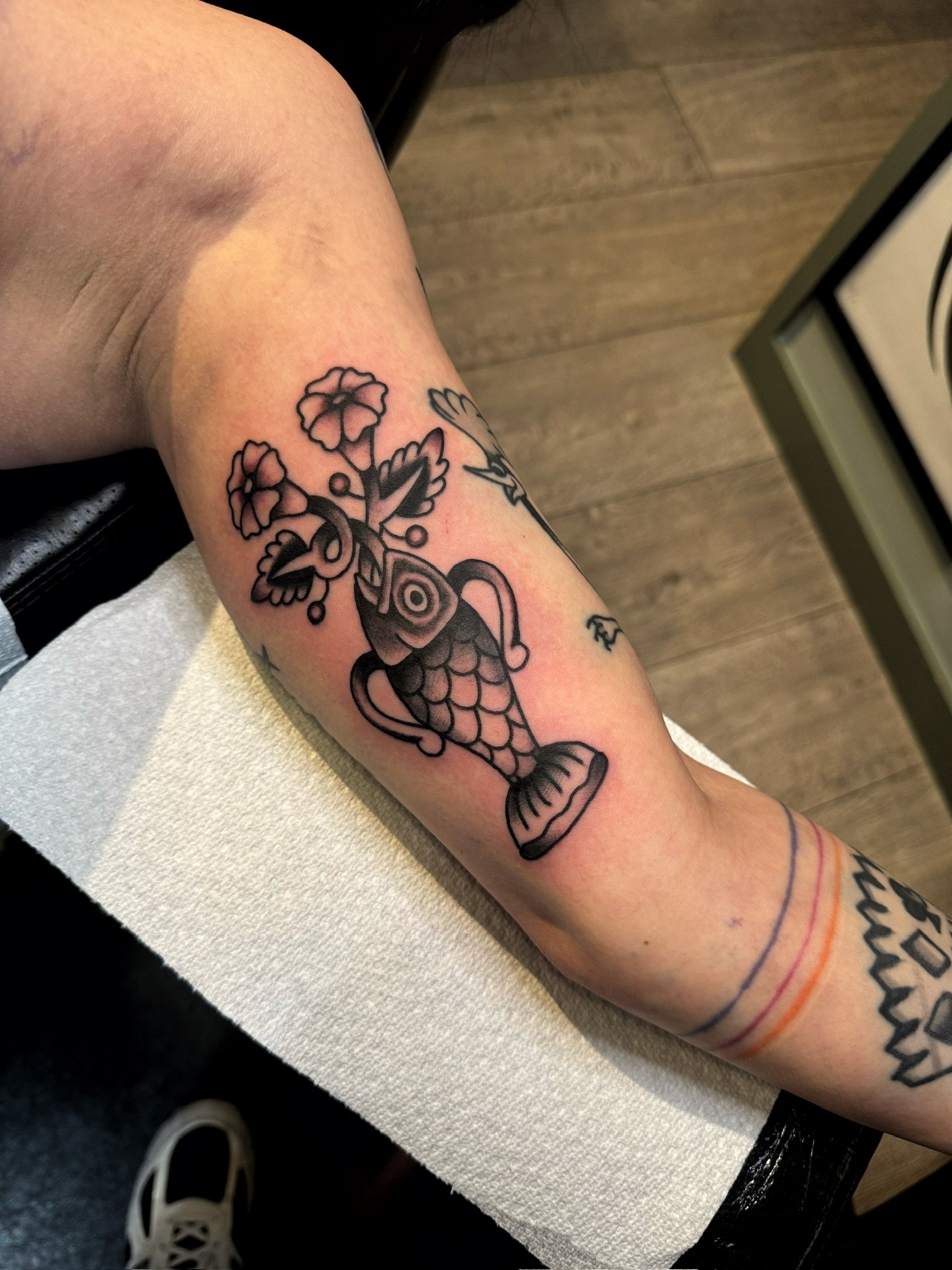 fish-vase-floral-blackwork-tattoo-arm-chicago.jpg