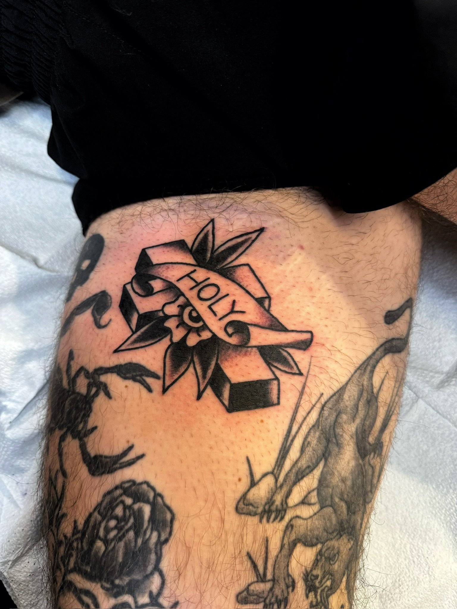 holy-banner-cross-blackwork-tattoo-leg-chicago.jpg