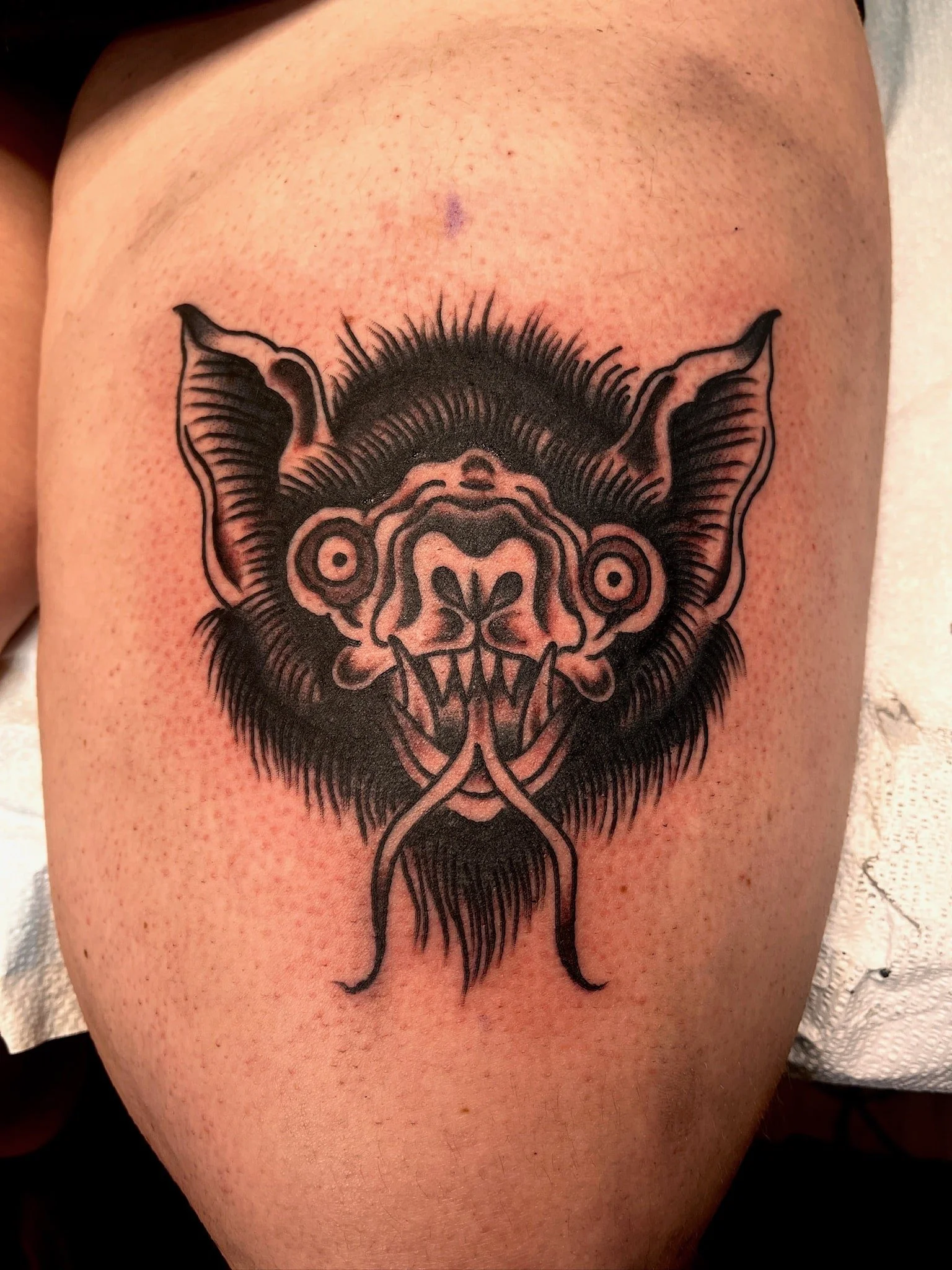 blackwork-bat-head-tattoo-thigh.jpg