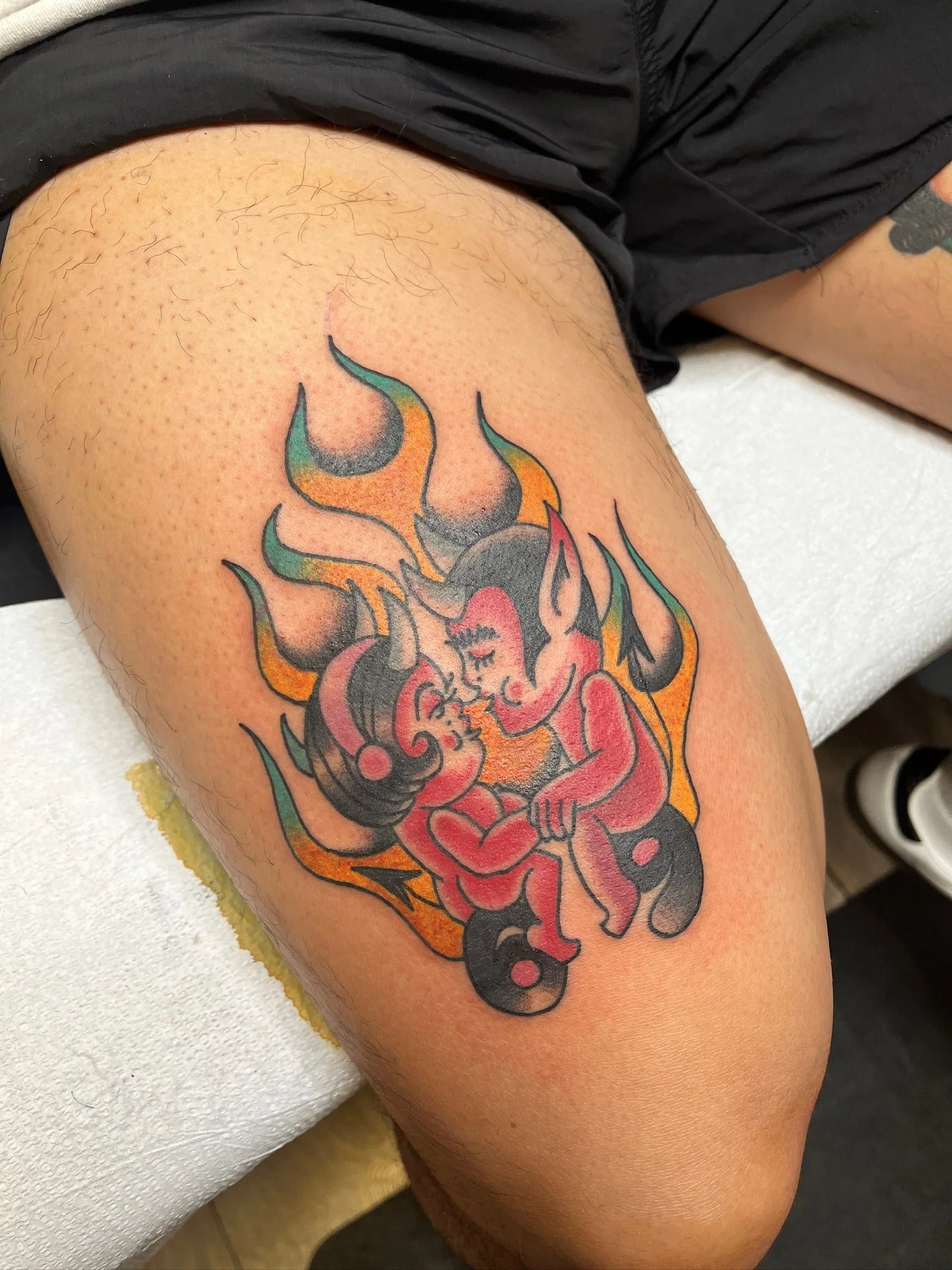 traditional-devil-couple-flames-tattoo-thigh.jpg