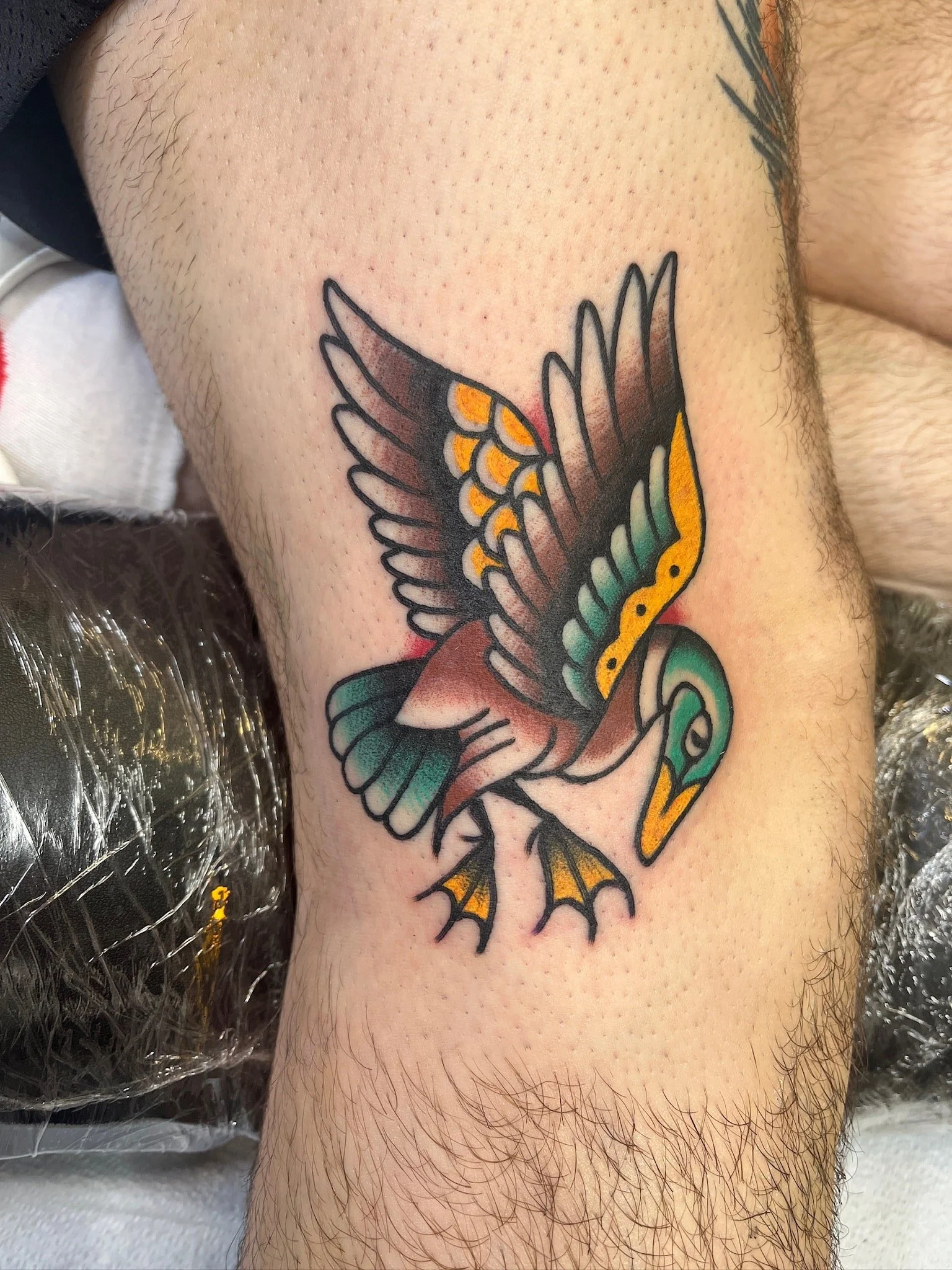 traditional-mallard-duck-flying-tattoo-leg.jpg