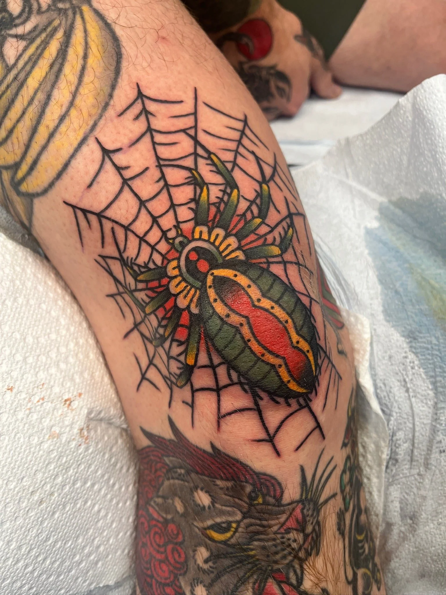 traditional-spider-web-tattoo-leg.jpg