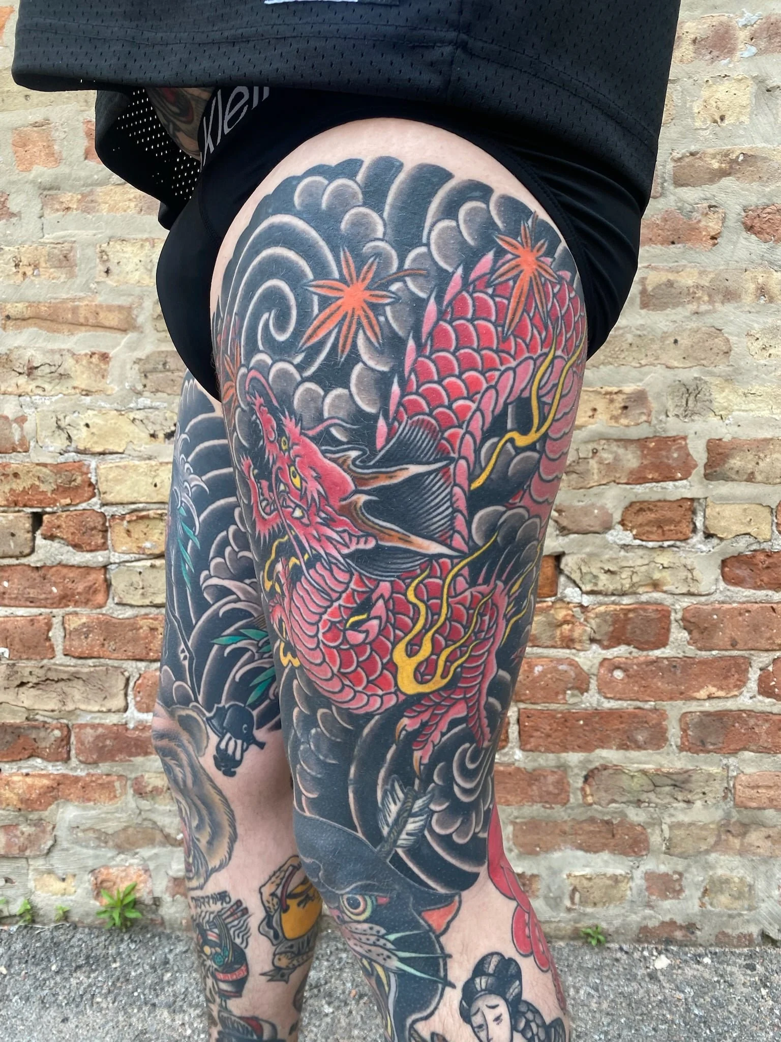 japanese-dragon-leg-sleeve-tattoo-side-left.jpg