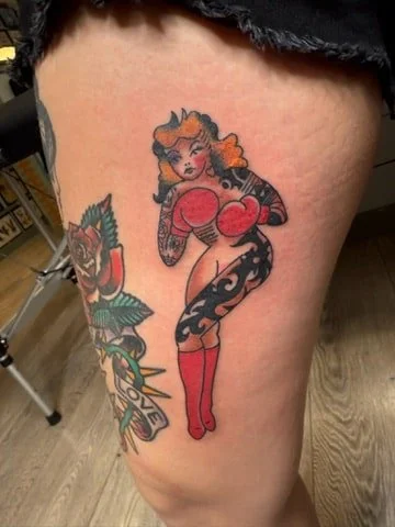 traditional-pinup-girl-tboxer-tribal-tattoo-great-lakes-tattoo-chicago.jpg