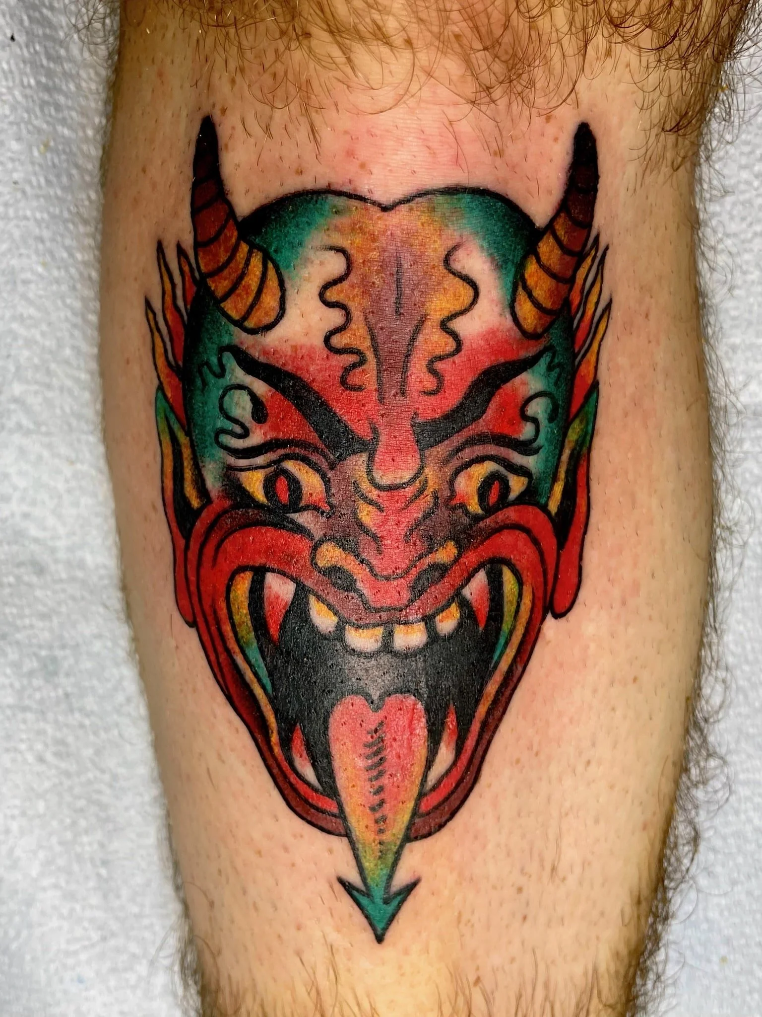 traditional-devil-face-color-chicago-great-lakes-tattoo.-min.jpeg
