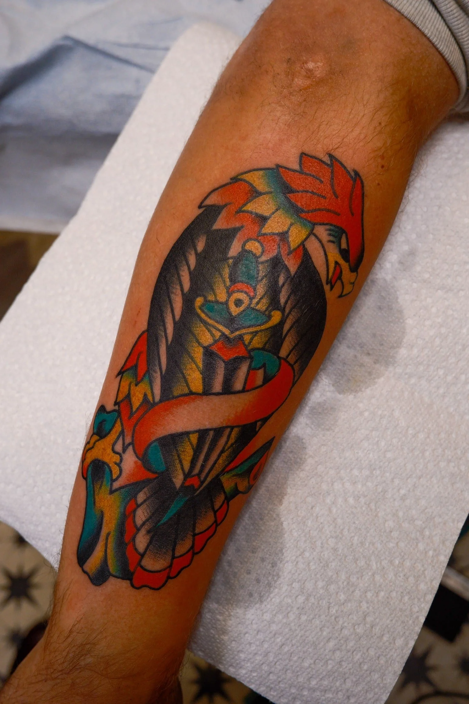 traditional-eagle-banner-dagger-color-chicago-great-lakes-tattoo-min.jpg