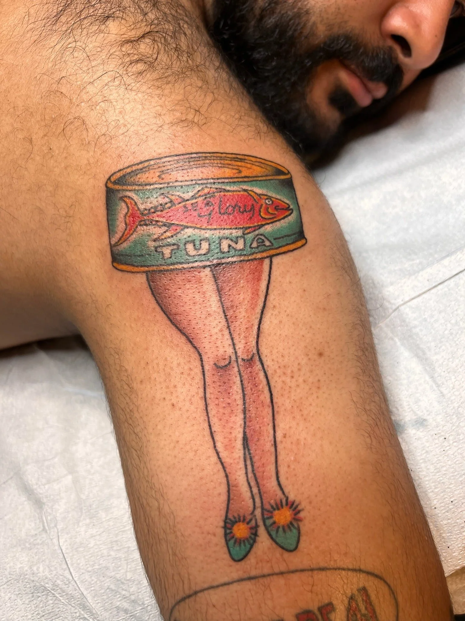 traditional-tuna-can-legs-tattoo-great-lakes-tattoo-chicago.jpg