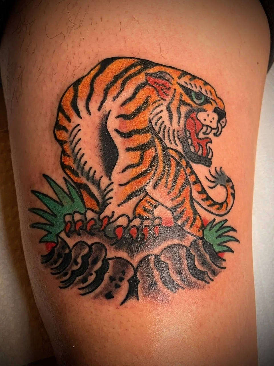 traditional-tiger-rocks-tattoo-great-lakes-tattoo-chicago.JPG
