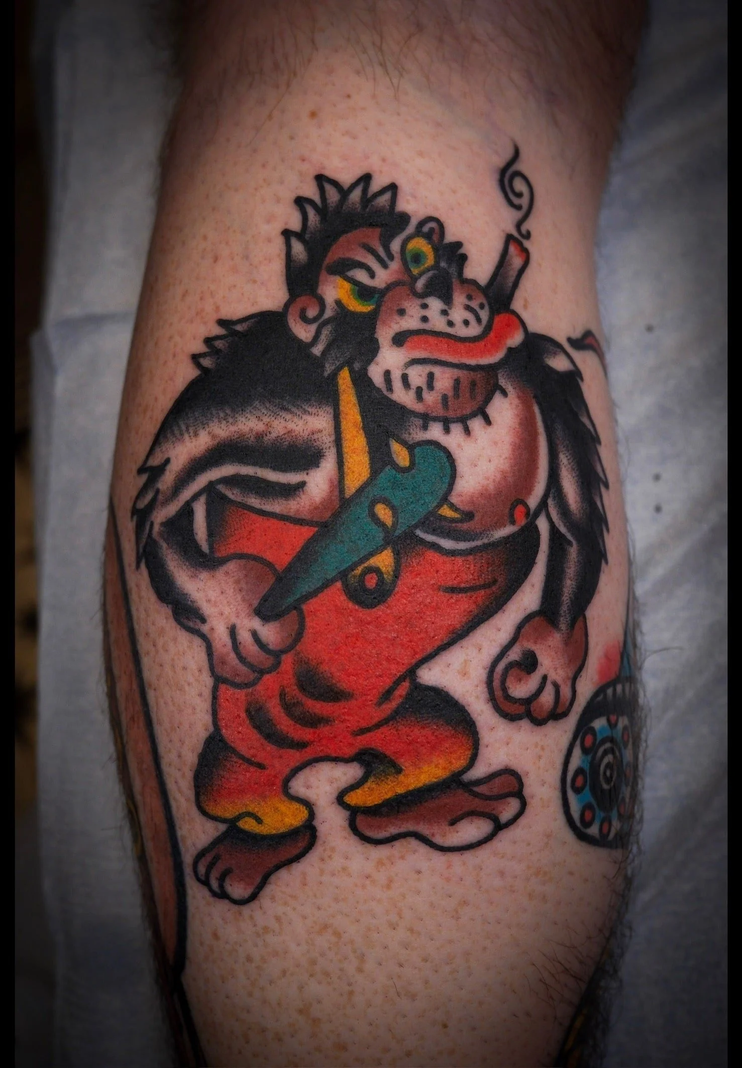traditional-angry-ape-dagger-color-chicago-great-lakes-tattoo-min.jpeg