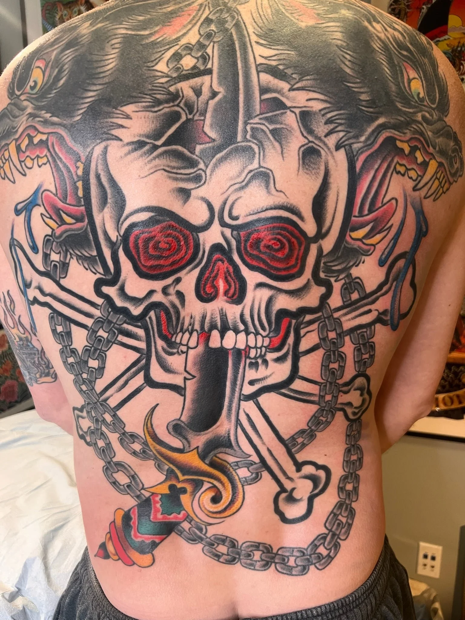 full-back-skull-bones-chain-traditional-tattoo-great-lakes-tattoo-chicago.jpg