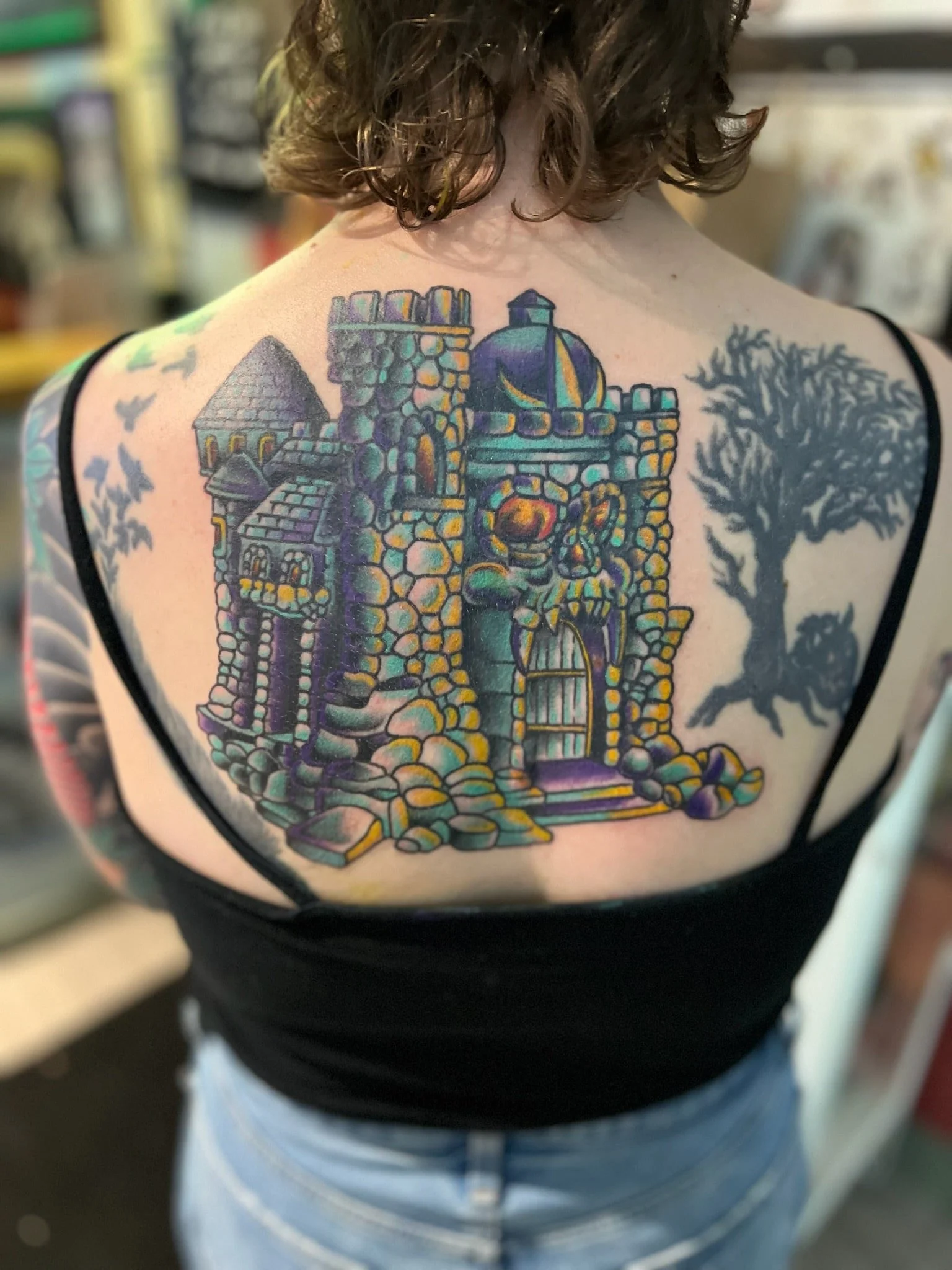 stone-castle-traditional-back-tattoo-great-lakes-tattoo-chicago.jpg