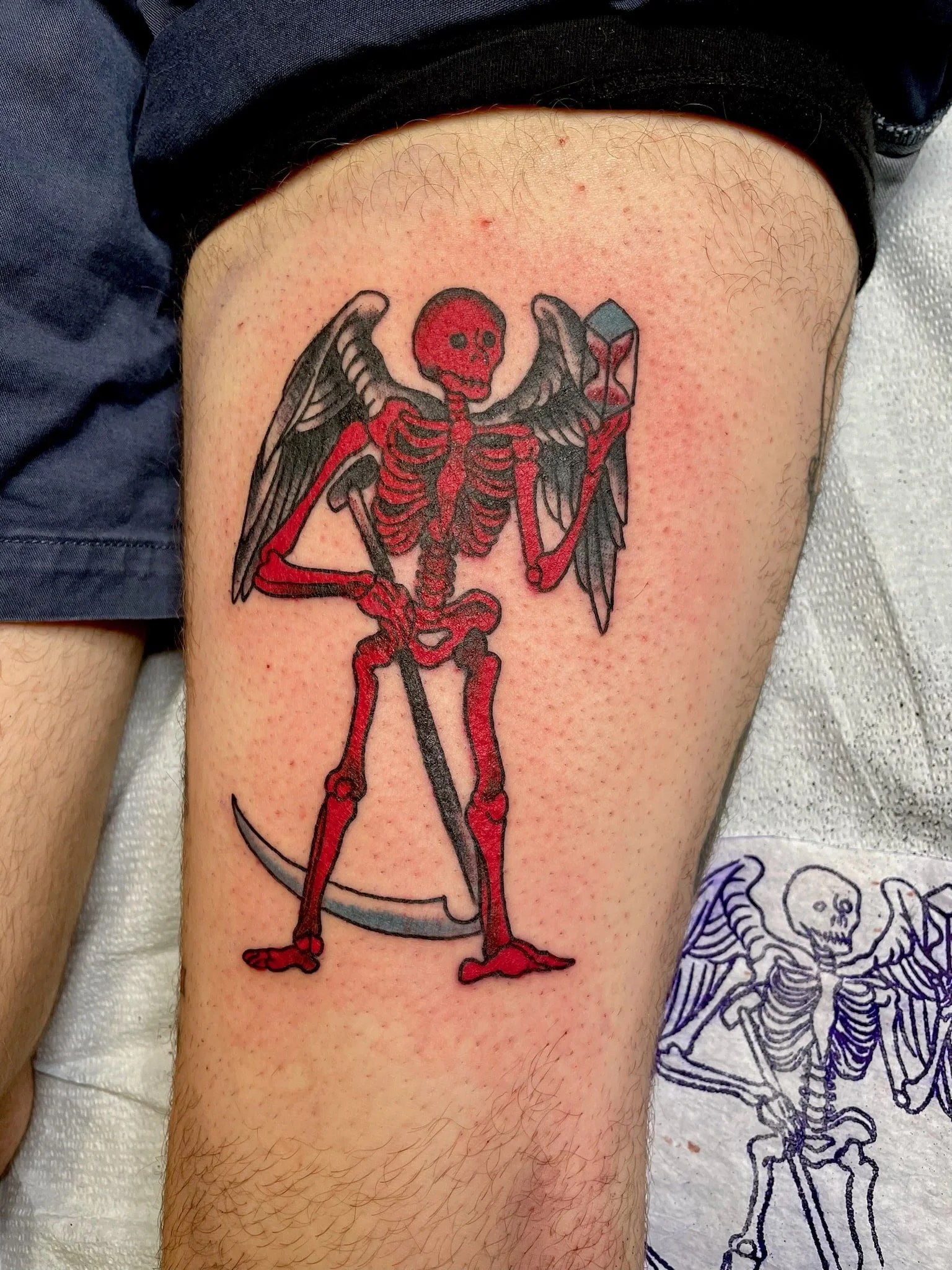 traditional-red-skeleton-angel-scythe-chicago-great-lakes-tattoo-min.jpeg