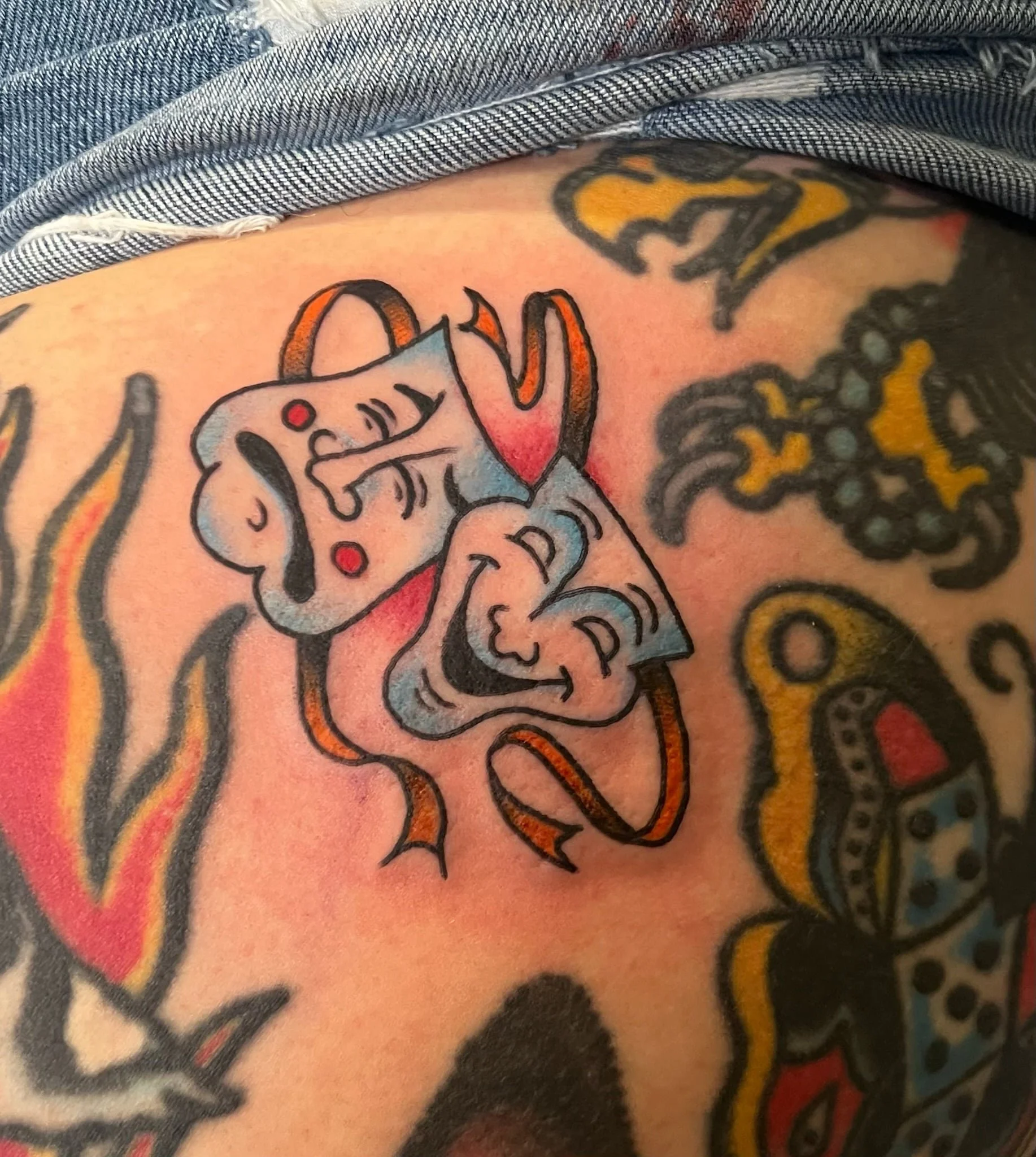 laugh-now-cry-later-mask-traditional-tattoo-great-lakes-tattoo-chicago.jpeg