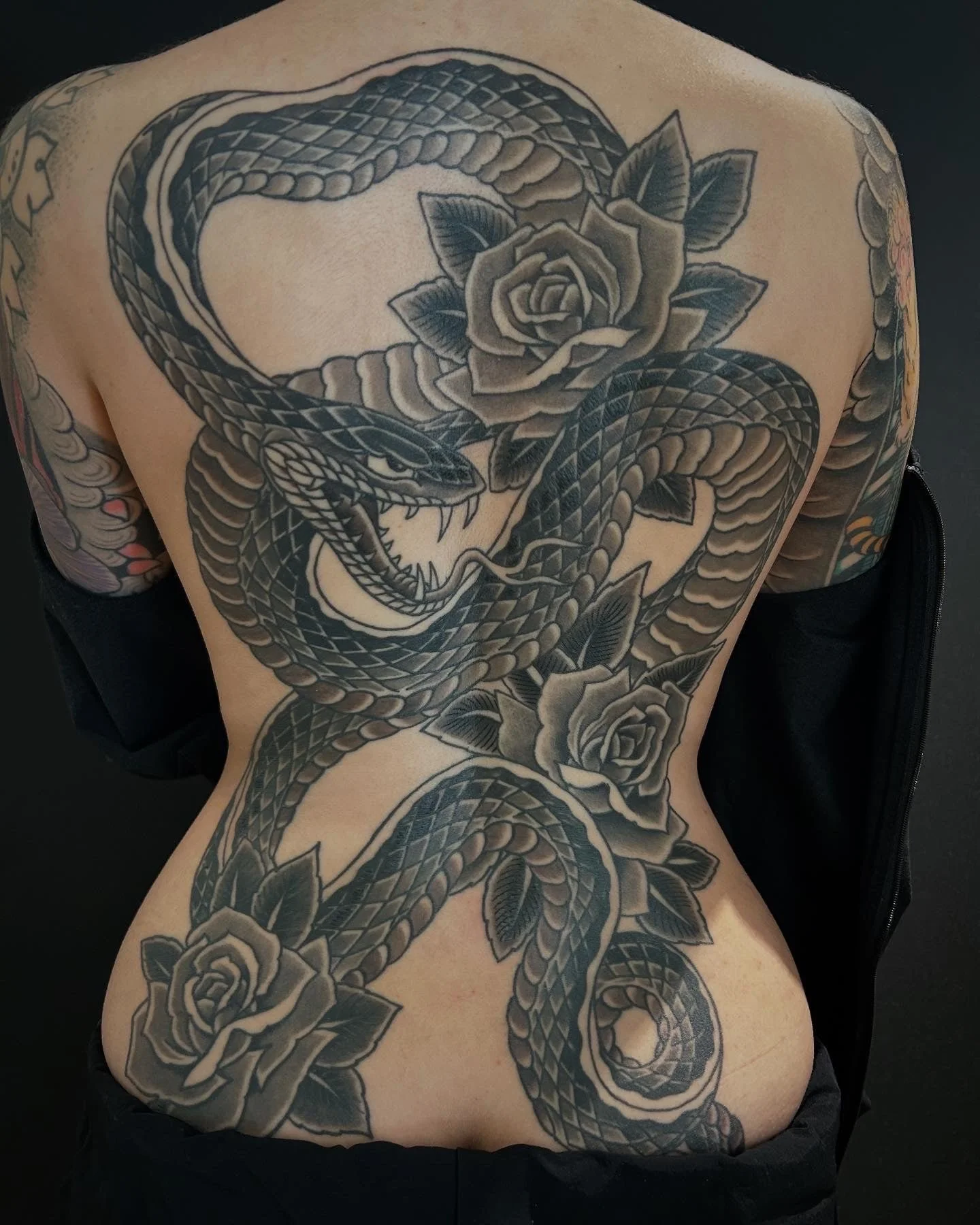 great-lakes-tattoo-chicago-black-and-grey-snake-rose-backpiece-tattoo-min.jpg