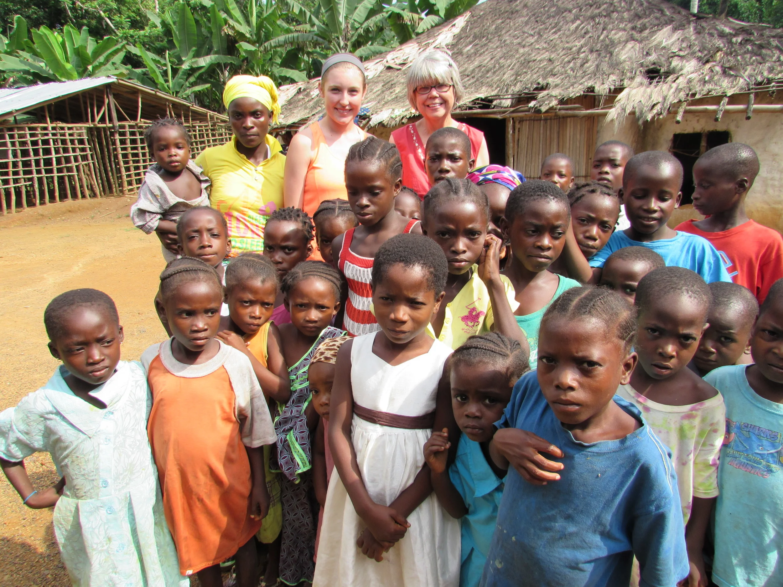  Rosemary Welch, along with granddaughter, Megan Comer in Liberia, W. Africa.