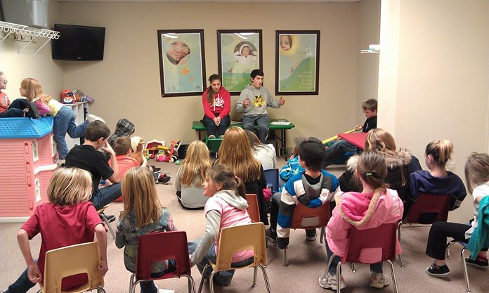  Braden and Carter Demark teaching Bible lessons to Recovery kids at Potters House