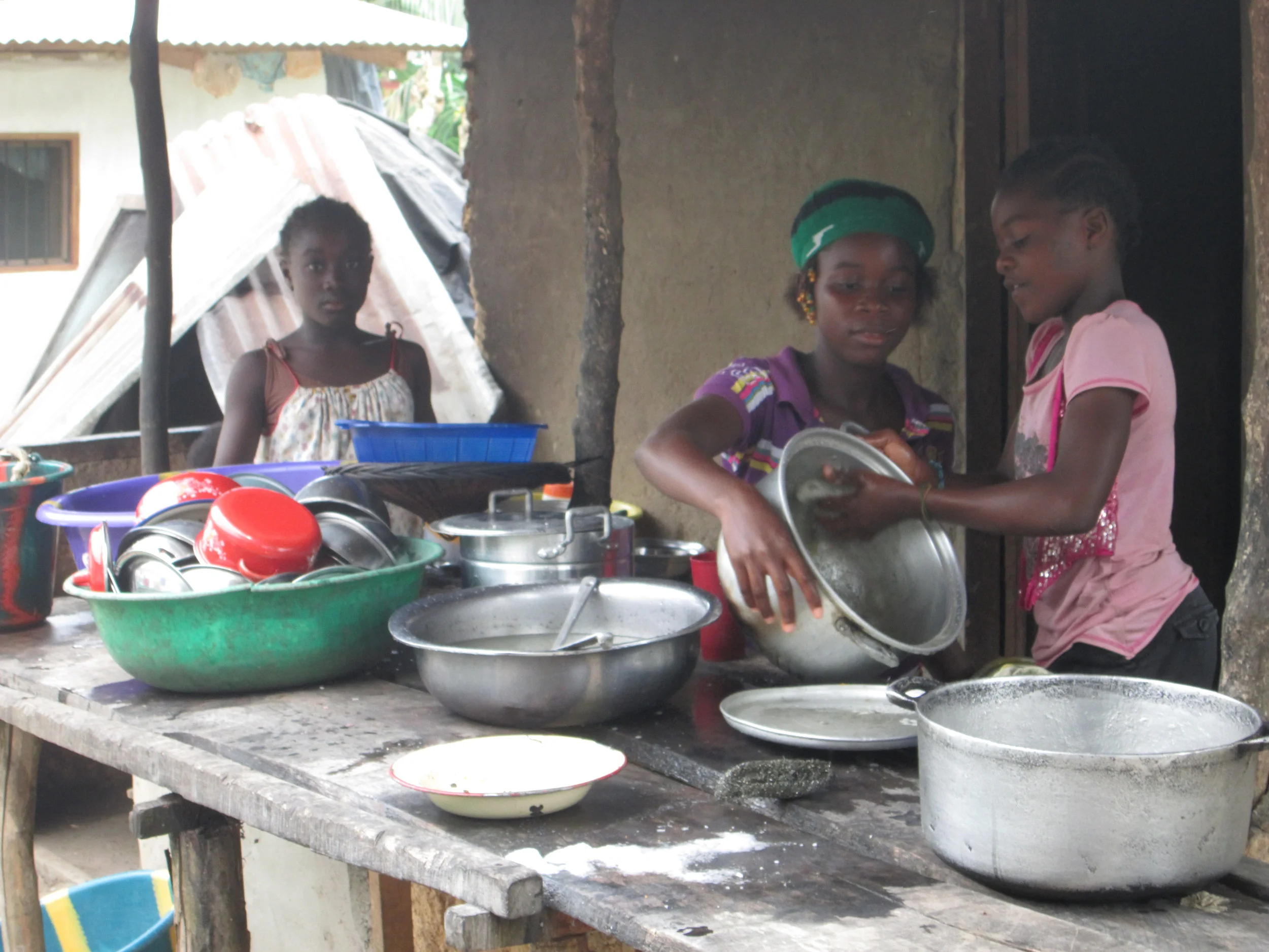  The Lott girls cooking and doing dishes for the Equip2serve team in January