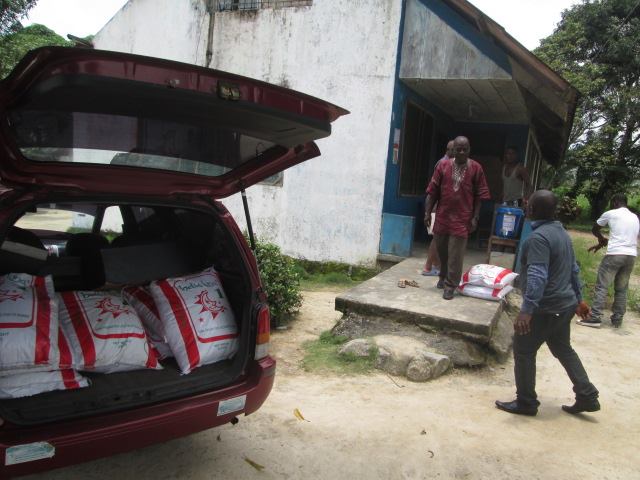  Loading, unloading and delivering rice to needy communities